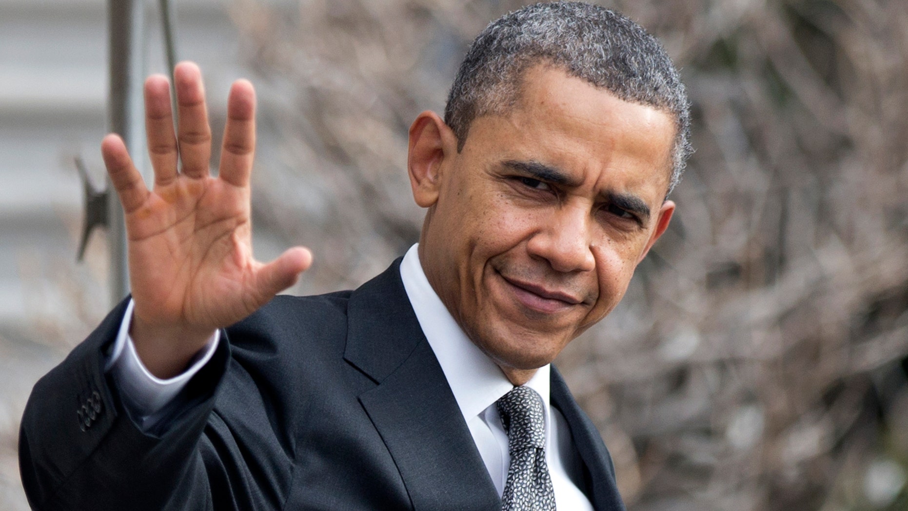FILE - In this Feb. 13, 2013, file photo, President Barack Obama waves as he leaves the White House in Washington. Obama and congressional Republicans made no progress last week in heading off $85 billion in budget-wide cuts that automatically start taking effect March 1. (AP Photo/Manuel Balce Ceneta, File)