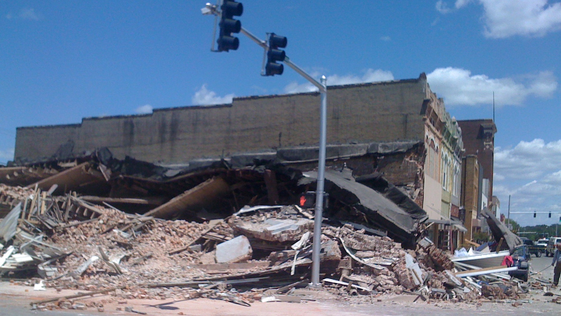May 16: A building that housed a beauty parlor in downtown Morrilton, Ark. collapsed killing a young girl and injuring at least five other people. According to police, rescue teams are searching the wreckage for possible survivors but they think most people escaped.