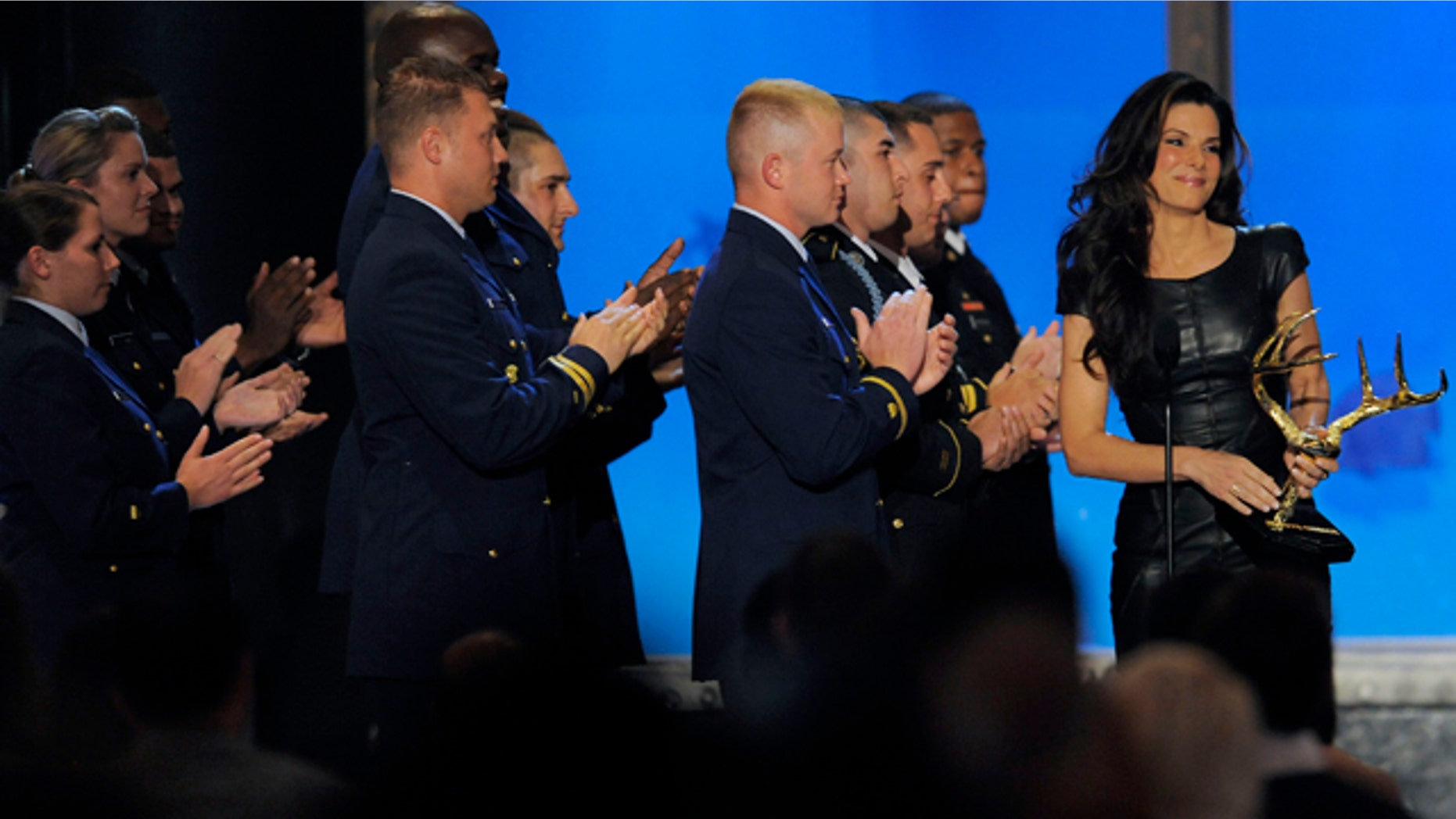 June 5: Sandra Bullock accepts the Troops Choice Award onstage at Spike TV "Guy's Choice" awards in Culver City, Calif.
