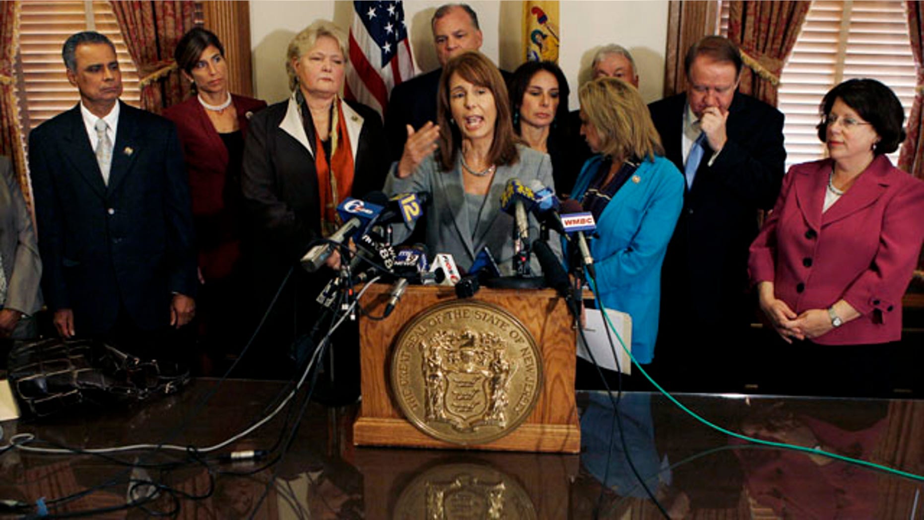 Oct. 25, 2010: New Jersey Sen. Barbara Buono, D-Edison, stands with other lawmakers in Trenton, N.J. as she answers a question about a bill they introduced to toughen the state's anti-bullying laws after the widely publicized suicide of Rutgers University student Tyler Clementi.