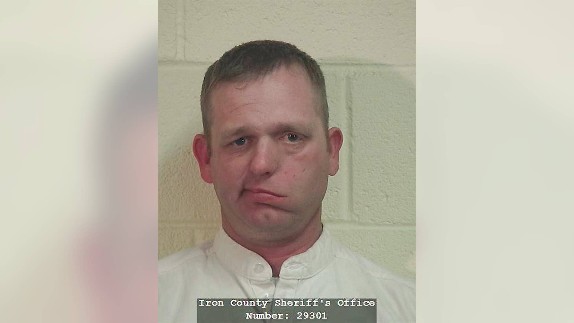This undated photo released by the Iron County Sheriff's office, shows Ryan Bundy. The son of southern Nevada rancher and states' rights advocate Cliven Bundy said Wednesday, Jan. 28, 2015, he spent a night in a southern Utah county jail after sheriff's deputies accused him of resisting arrest when he appeared in a justice court for an unrelated code violation summons. (AP Photo/Iron County Sheriffs Office)