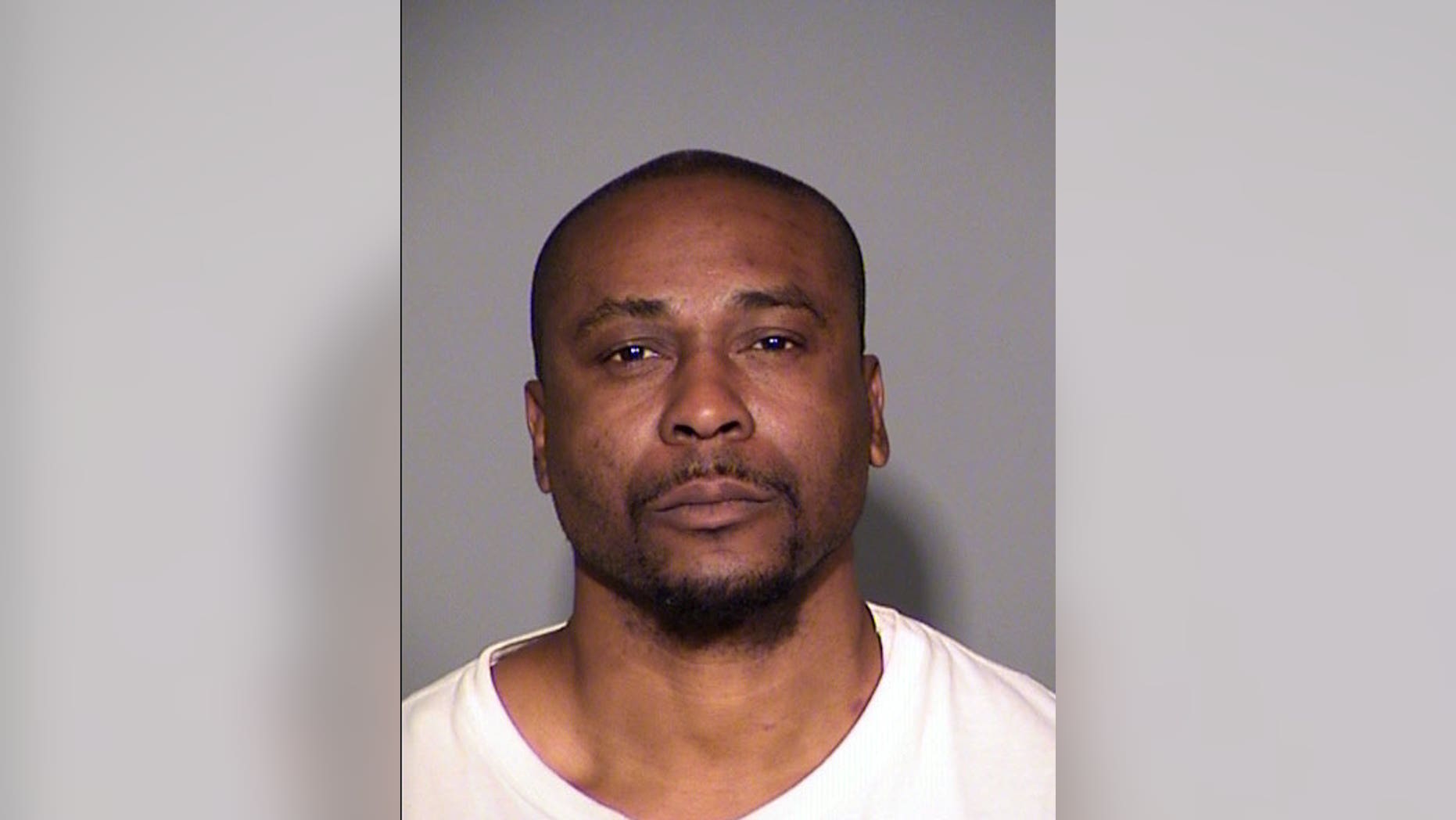 This booking photo provided by Indianapolis Police department, shows William Gholston of Indianapolis. Gholston has been charged in the killing of a 15-year-old girl whose badly burned body was found in an Indianapolis backyard. Authorities charged Gholston with murder on Thursday, Nov. 20, 2014, in Dominique Allen's death. Marion County Prosecutor Terry Curry said Friday that DNA found on Allen's sandals and body matched samples from the 46-year-old Gholston in the state inmate database. (AP Photo/Indianapolis Police Department)