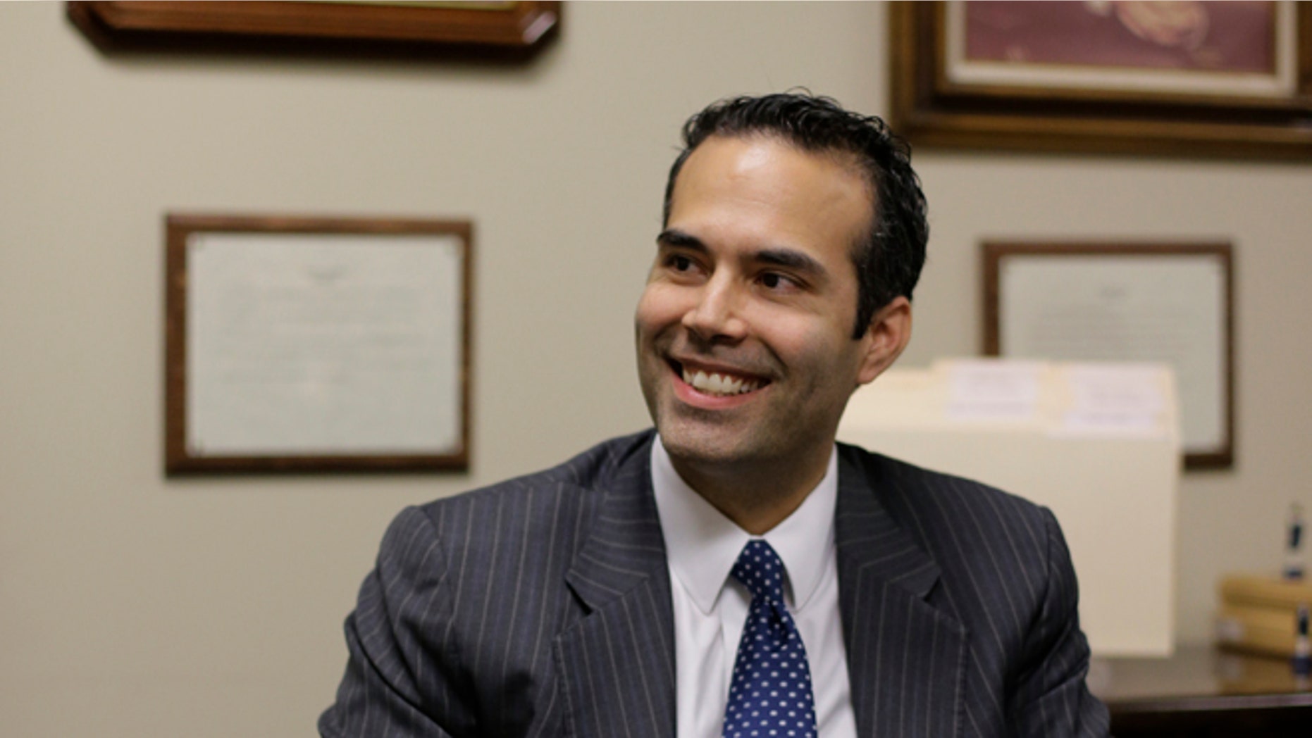 FILE: Nov. 19, 2013: George P. Bush visits the Republican Party of Texas headquarters where he formally filed to run for Texas land commissioner, in Austin, Texas.