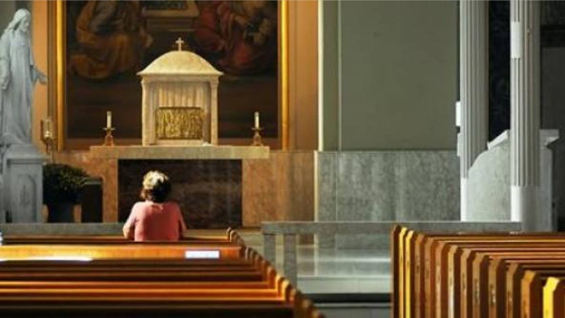 A survey shows nearly half of Americans worry about their religious rights. (Butch Comegys/The Times & Tribune via AP)