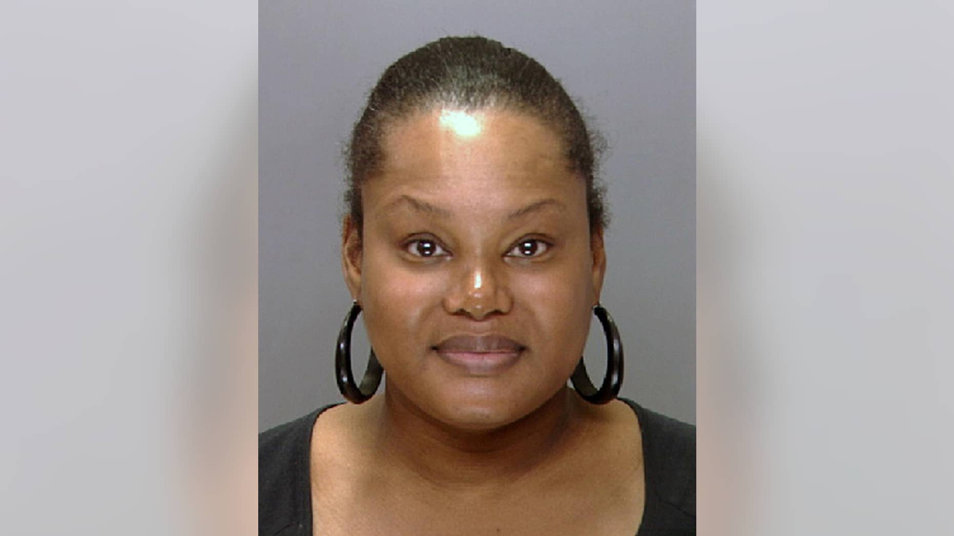 FILE - This undated file photo provided by the Philadelphia Police Department shows Padge Gordon, also known as Padge Victoria Windslowe. An aspiring rapper known as "the Black Madam," Windslowe is accused of killing a 20-year-old dancer from London during a procedure that involved silicone buttocks injections and Krazy Glue. Her third-degree murder trial is expected to start Thursday, Feb. 19, 2015 in Philadelphia Common Pleas Court. (AP Photo/Philadelphia Police Department, File)