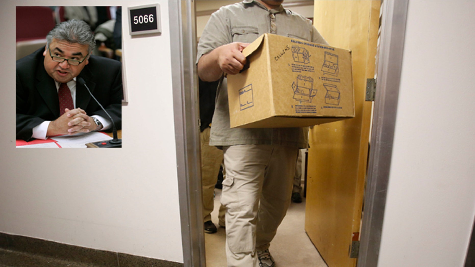 An FBI agent carries out a box as he leaves the Capitol office of State Sen. Ron Calderon, D-Montebello, in Sacramento, Calif., Tuesday, June 4, 2013. Search warrants were served about at Calderon's office and the office of the Legislature's Latino caucus, around 3 p.m., but would not disclose the reason for the investigation. Calderon was not present during the search.(AP Photo/Rich Pedroncelli)