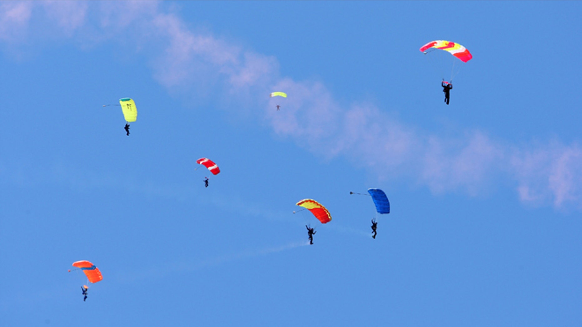 SAN FRANCISCO - AUGUST 05: Skydivers land at Marina Green for the largest aerial skydive ever performed in San Francisco, in celebration of the launch of the T-Mobile myTouch 3G phone with Google on August 5, 2009 in San Francisco, California. (Photo by John Shearer/Getty Images for T-Mobile)
