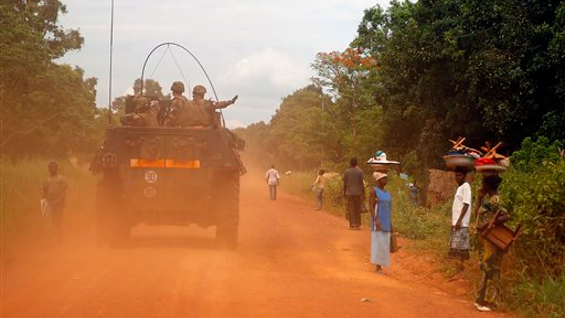 FILE - This April 11, 2014, image shows French forces patrolling in Sibut, some 140 miles northeast of Bangui, Central African Republic. French prosecutors and military authorities are investigating accusations that French soldiers in Central African Republic sexually abused children they were sent to protect. (AP Photo/Jerome Delay, File)