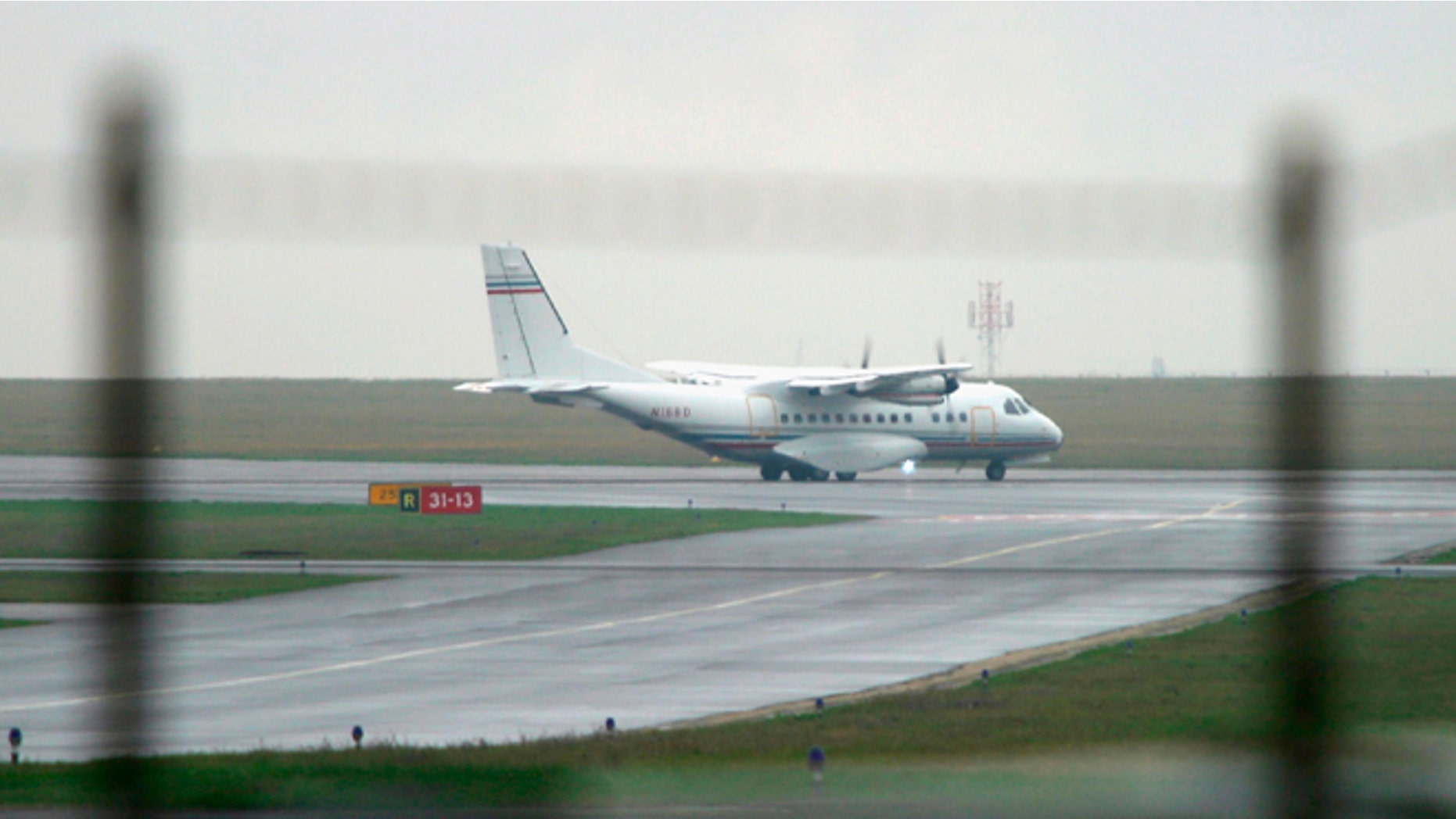 PRAGUE, CZECH REPUBLIC - APRIL 8: (FILE PHOTO) A Casa 235 turboprop plane with registration number N168D taxis along a runway at Ruzyne Airport April 8, 2005 in Prague, Czech Republic. According to airport flight records the plane was registered to the firm Aero Contractors, based in North Carolina, and was scheduled to fly from Prague to Kabul, Afghanistan. In May, 2005 the New York Times reported that Aero Contractors was involved in transporting terrorism suspects to third countries. And on November 17, 2005, Agence France Presse reported that a plane with registration number N168D and owned by Devon Holding and Leasing passed through Danish airspace on October 3, 2005 en route from Iceland to Budapest. Countries across Europe are investigating reports that airplanes flying for the CIA landed at their airports or passed through their airspace without their permission. (Photo by Pavel Horejsi/Getty Images)