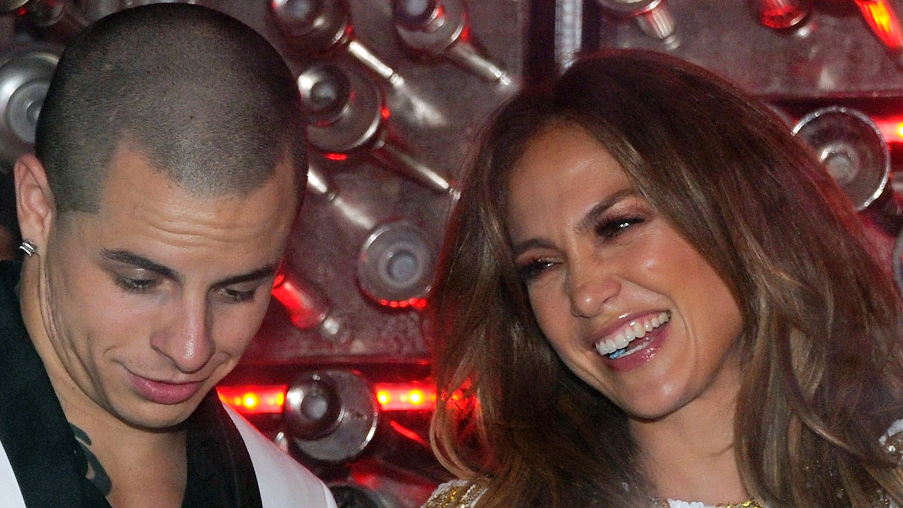 LAS VEGAS, NV - MAY 27: Dancer Casper Smart (L) and singer/actress Jennifer Lopez share a laugh as they celebrate the launch of Lopez's new single, "Goin' In" at Hyde Bellagio at the Bellagio May 27, 2012 in Las Vegas, Nevada. (Photo by Ethan Miller/Getty Images for Hyde Bellagio)
