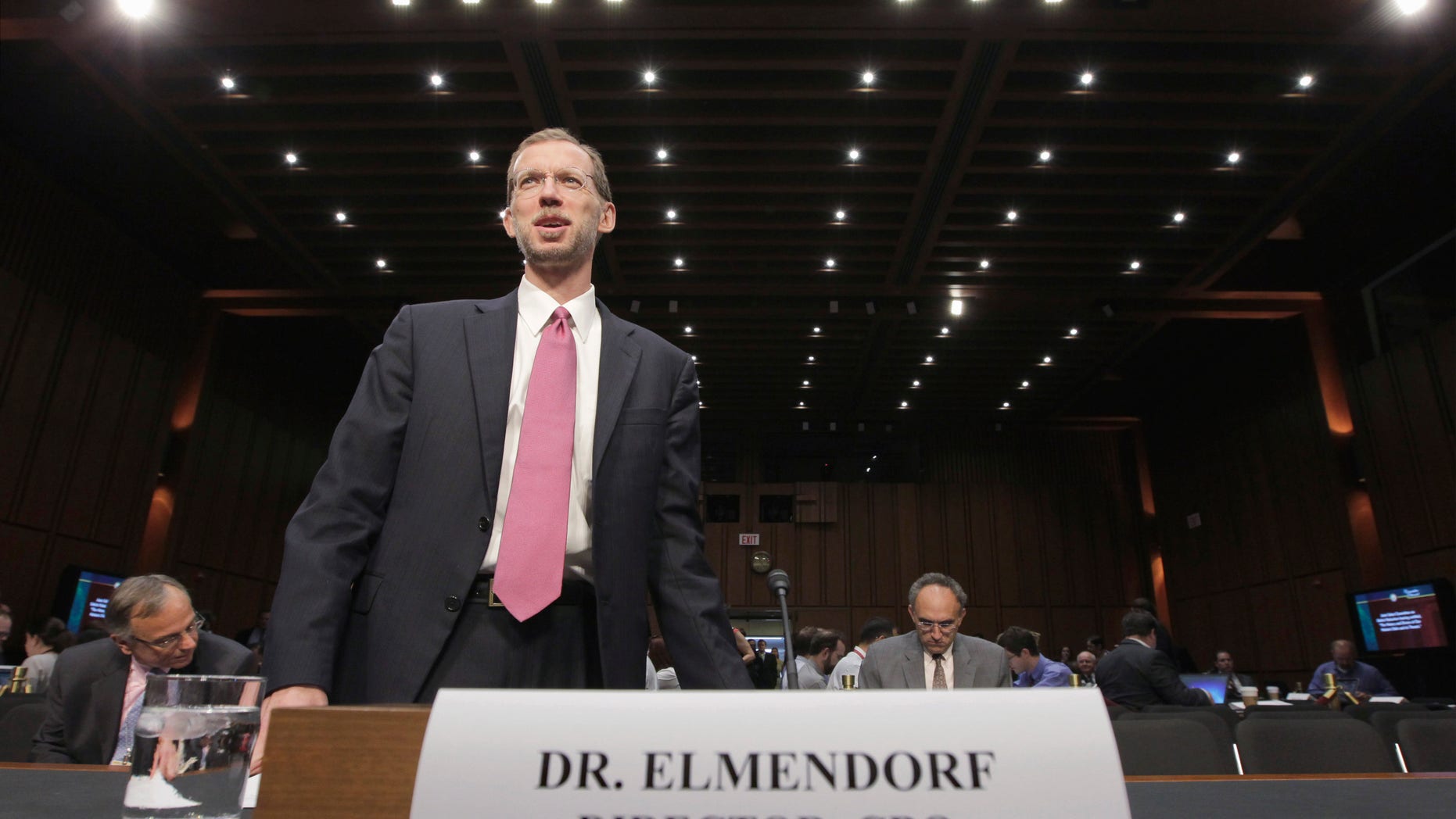 Congressional Budget Office Director Douglas Elmendorf arrives on Capitol Hill in Washington, Tuesday, Sept. 13, 2011, to testify on the national debt at a hearing of the Joint Select Committee on Deficit Reduction.