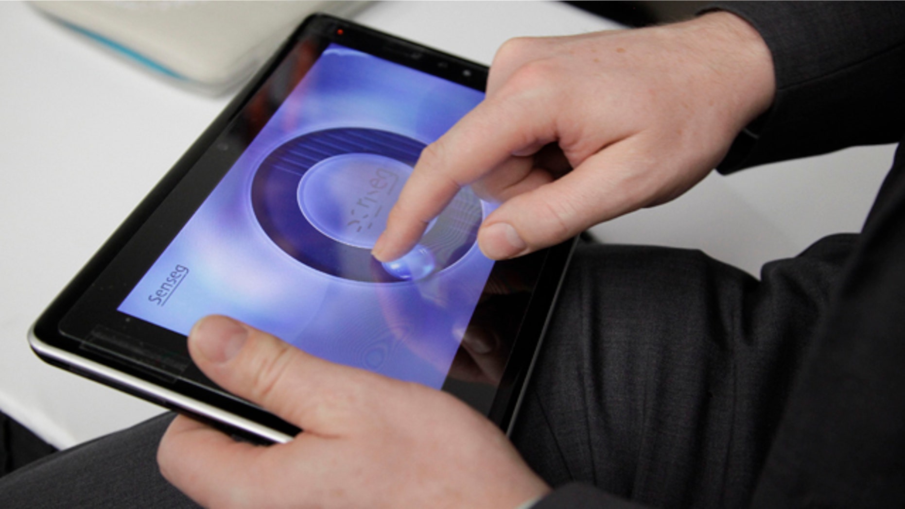 Jan. 11, 2012: A tablet made by Senseg is demonstrated at the 2012 International CES tradeshow in Las Vegas. The tablet gives the user tactile feedback at the touch of the screen.