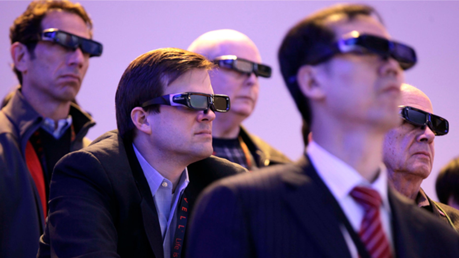 Jan. 6, 2011: Attendees watch a 3D HDTV presentation by Panasonic at the 2011 Consumer Electronics Show, in Las Vegas.