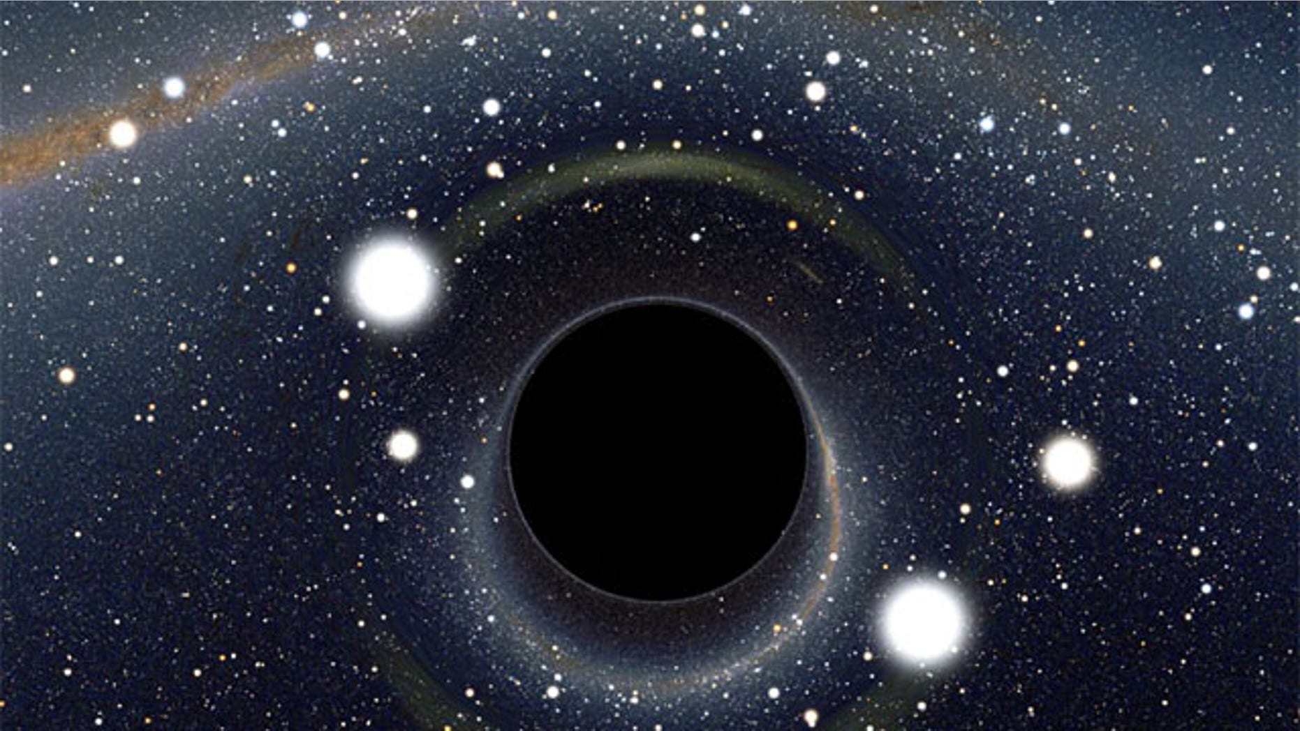 A computer-generated image of a black hole from above. Light would be visually distorted by the black hole's immense gravity.