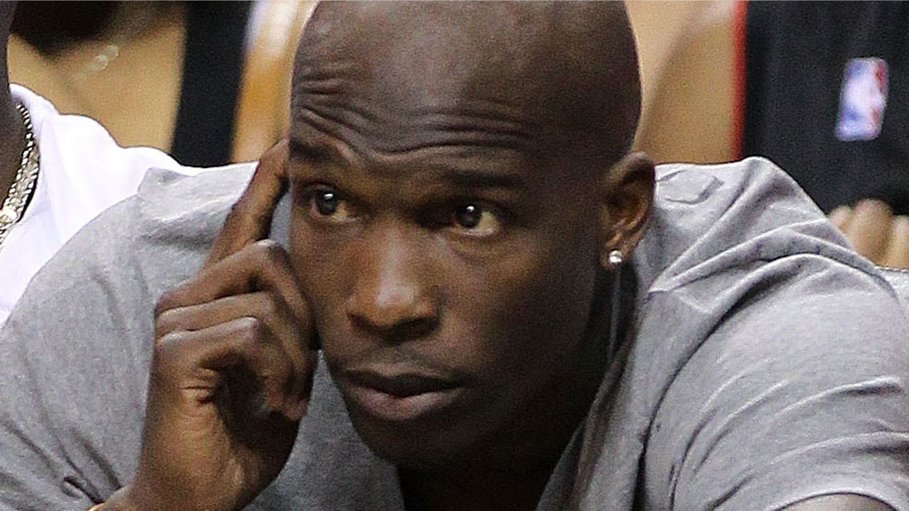 MIAMI, FL - APRIL 10: Football player Chad Johnson watches a game between the Miami Heat and the Boston Celtics at American Airlines Arena on April 10, 2011 in Miami, Florida. NOTE TO USER: User expressly acknowledges and agrees that, by downloading and/or using this Photograph, User is consenting to the terms and conditions of the Getty Images License Agreement. (Photo by Mike Ehrmann/Getty Images)