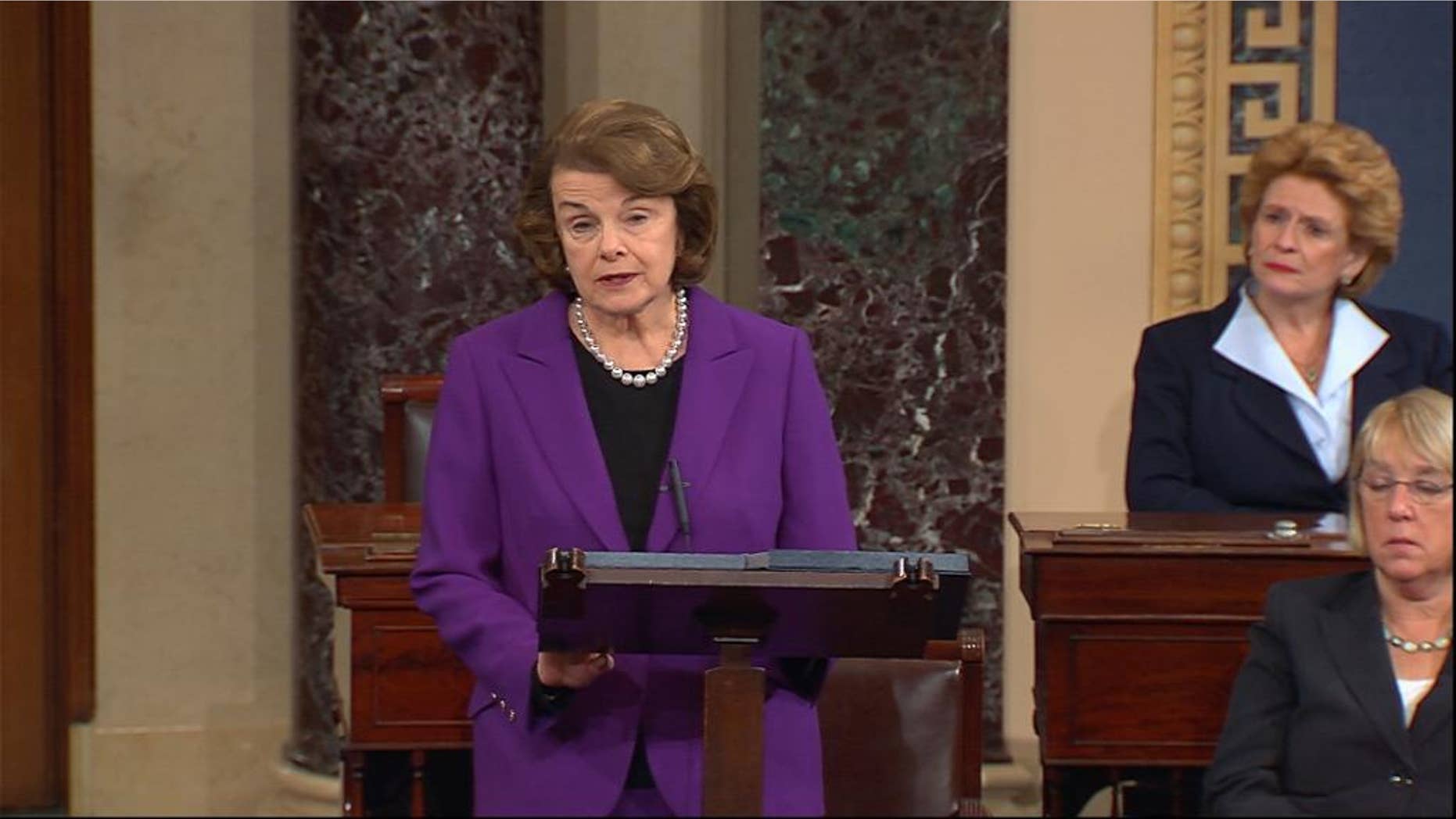 Dec. 9, 2014: This frame grab from video, provided by Senate Television, shows Senate Intelligence Committee Chair Sen. Dianne Feinstein, D-Calif. speaking on the floor of the Senate on Capitol Hill in Washington. Sen. Debbie Stabenow, D-Mich. is at center, Sen. Patty Murray, D-Wash. is at right.