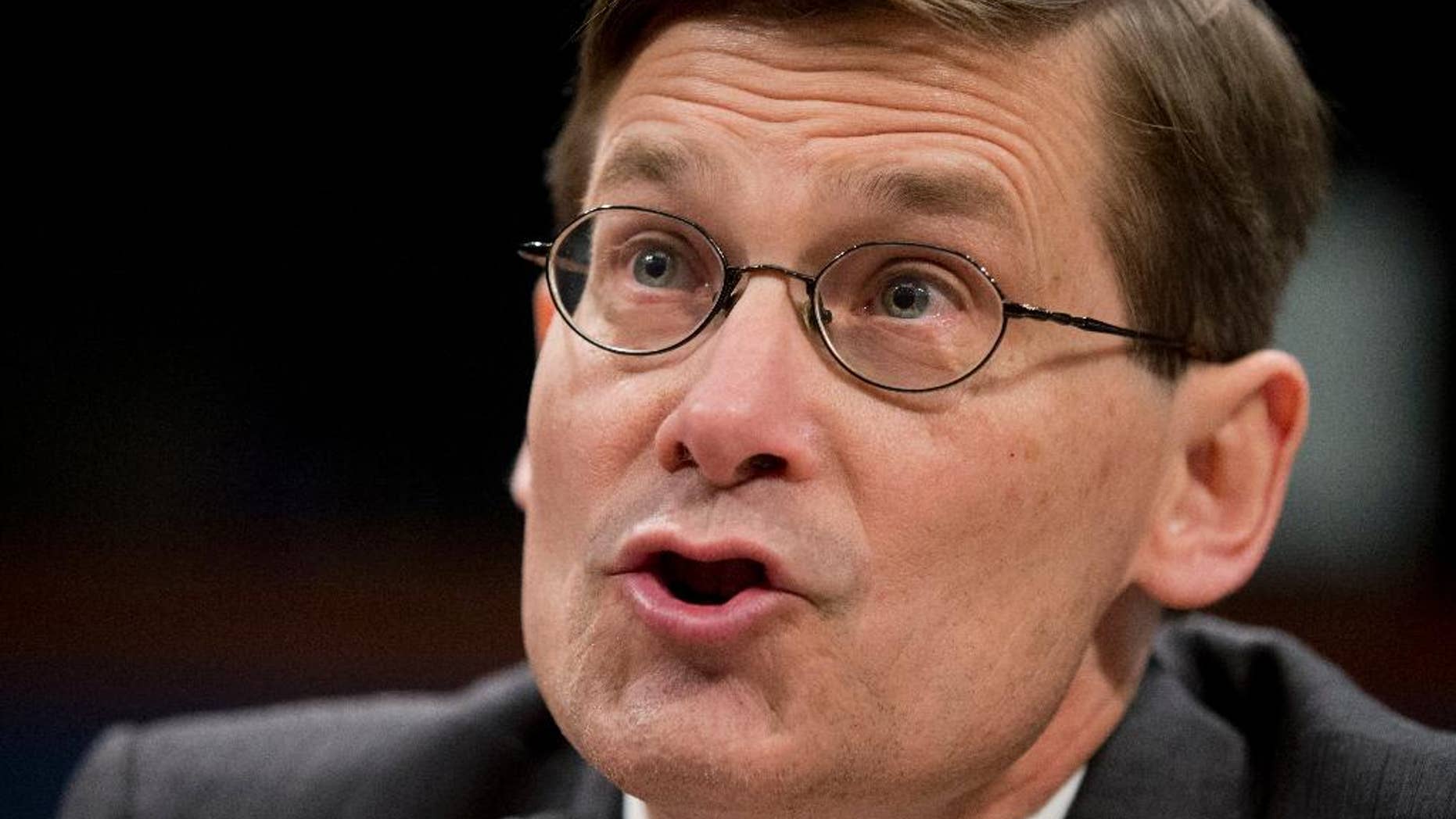 FILE - In this April 2, 2014 file photo, former CIA Deputy Director Michael Morell testifies on Capitol Hill in Washington. The former deputy CIA director made a series of factual misstatements while defending the agency's harsh treatment of detainees in his recent book, Senate intelligence committee staffers assert in a 54-page document filed with citations from CIA records. The detailed critique of the memoir by Michael Morell shows the extent to which critics and backers continue to try to shape public perceptions of the CIA's post 9/11 detention and interrogation program, even months after the release of a Senate report that sought to render a final judgment on it. (AP Photo/Manuel Balce Ceneta, File)
