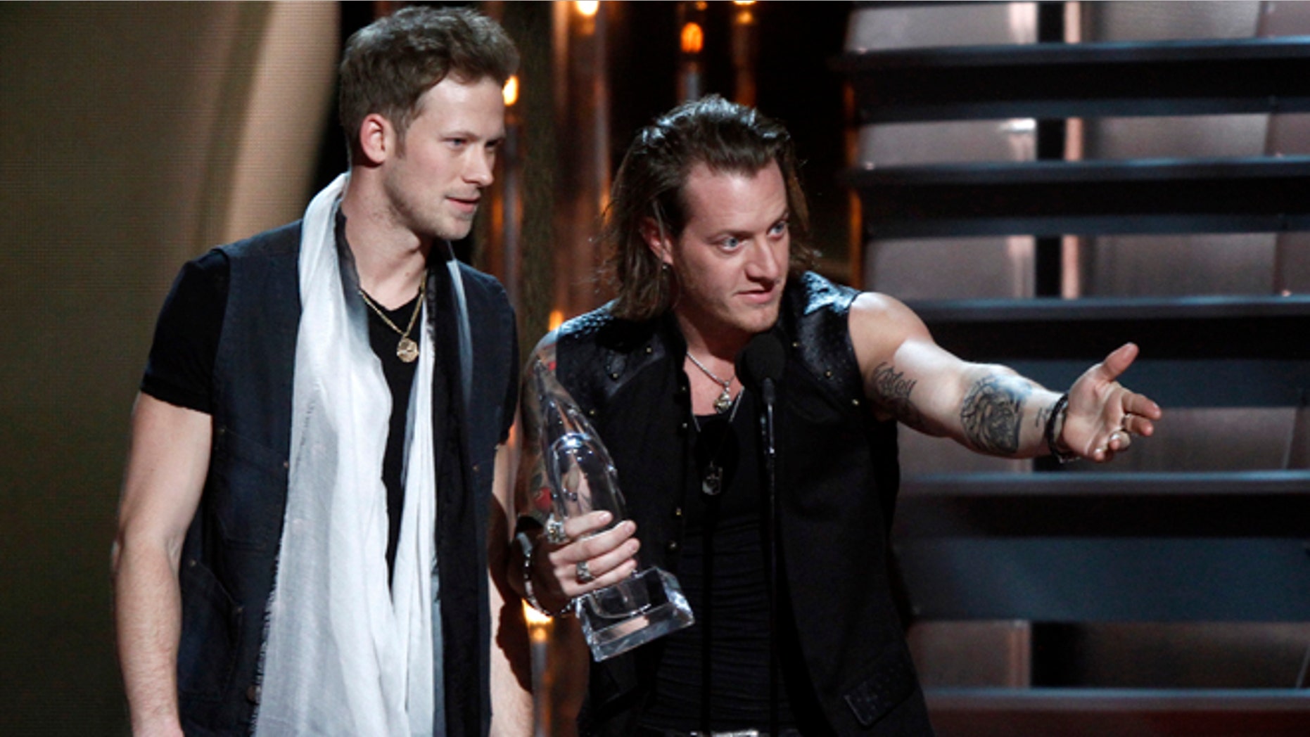 Nov. 6, 2013: Brian Kelley, left, and Tyler Hubbard, of Florida Georgia Line, accept the award for vocal duo of the year at the 47th annual CMA Awards at Bridgestone Arena in Nashville, Tenn.