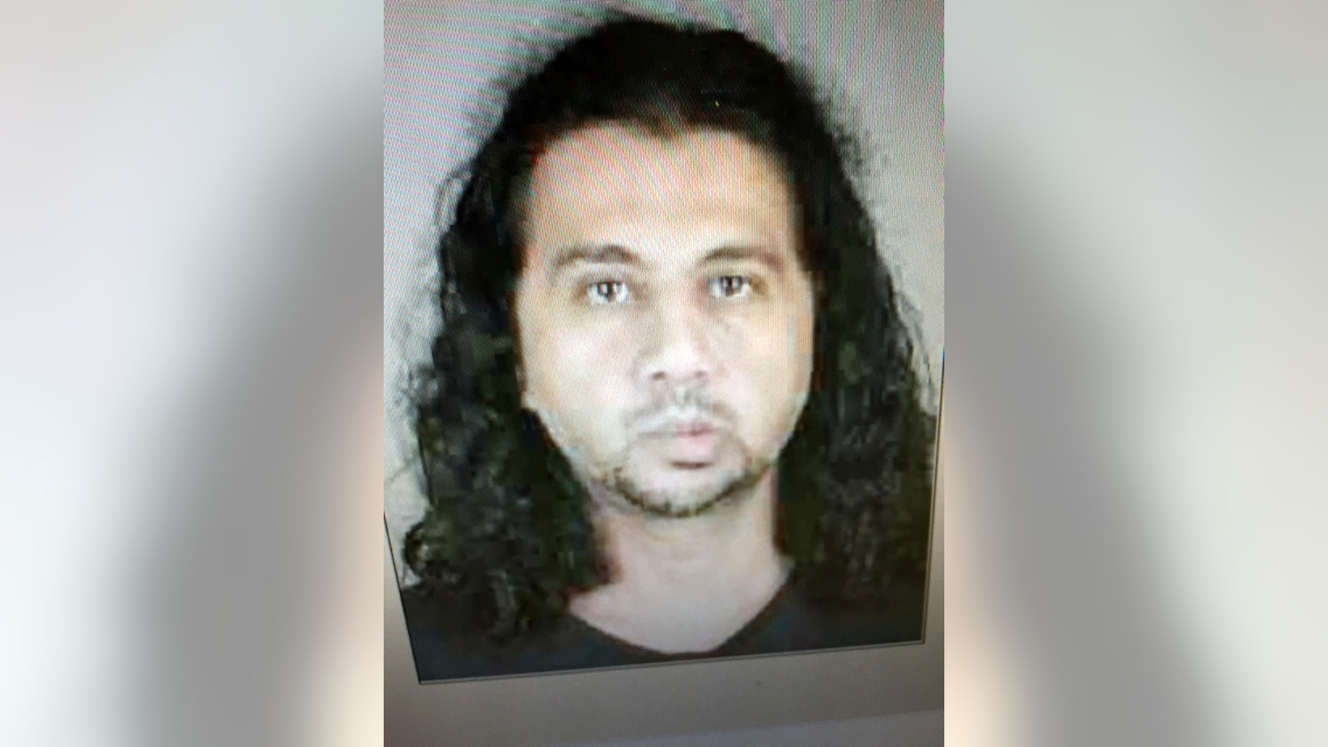 CORRECTS SPELLING OF LACKAWANNA - In this 2013 arrest photo provided by the Lackawanna, N.Y. Police Department, Arafat Nagi is shown. Police say that Nagi made an oath to the Islamic State group online, outfitted himself to fight and had a one-way ticket to the Middle East when they arrested him July 29, 2015. The western New York man was arraigned Monday, Aug. 17, 2015 on an indictment charging him with attempting to provide material support to terrorism. (Lackawana, N.Y. Police Department via AP)