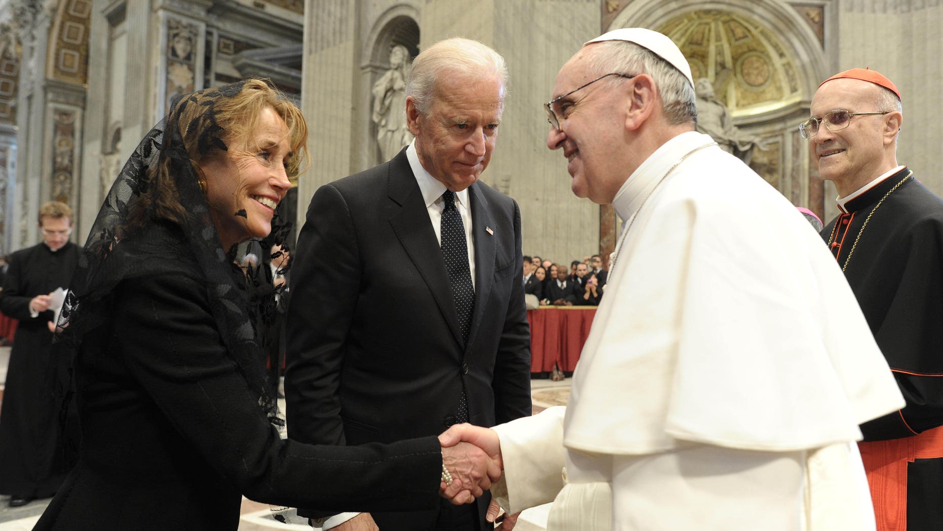 In this photo provided by the Vatican paper L'Osservatore Romano, Pope Francis meets U.S. Vice President Joe Biden and his sister, Valerie Biden Owens, after his installation Mass at the Vatican on Tuesday, March 19, 2013. Pope Francis has urged princes, presidents, sheikhs and thousands of ordinary people gathered for his installation Mass to protect God's creation, the weakest and the poorest of the world. (AP Photo/L'Osservatore Romano)