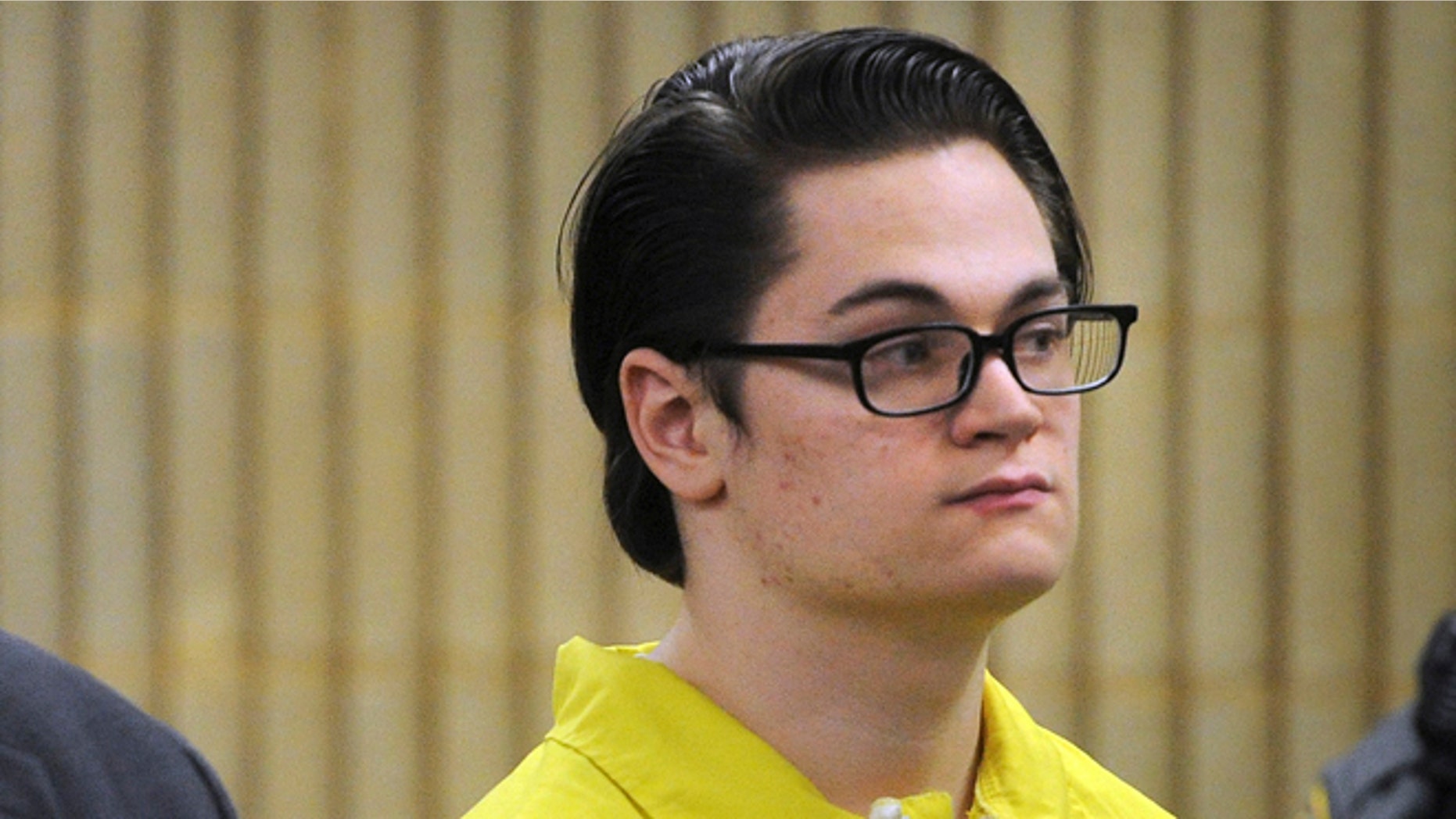 In this Jan. 28, 2016, file photo, Christopher Plaskon stands during a hearing in Superior Court in Milford, Conn. Plaskon is charged with murdering classmate Maren Sanchez, 16, in a stairwell at Milford's Jonathan Law High School on the day of the junior prom on April 25, 2014. (Brian A. Pounds/Hearst Connecticut Media via AP, Pool, File)