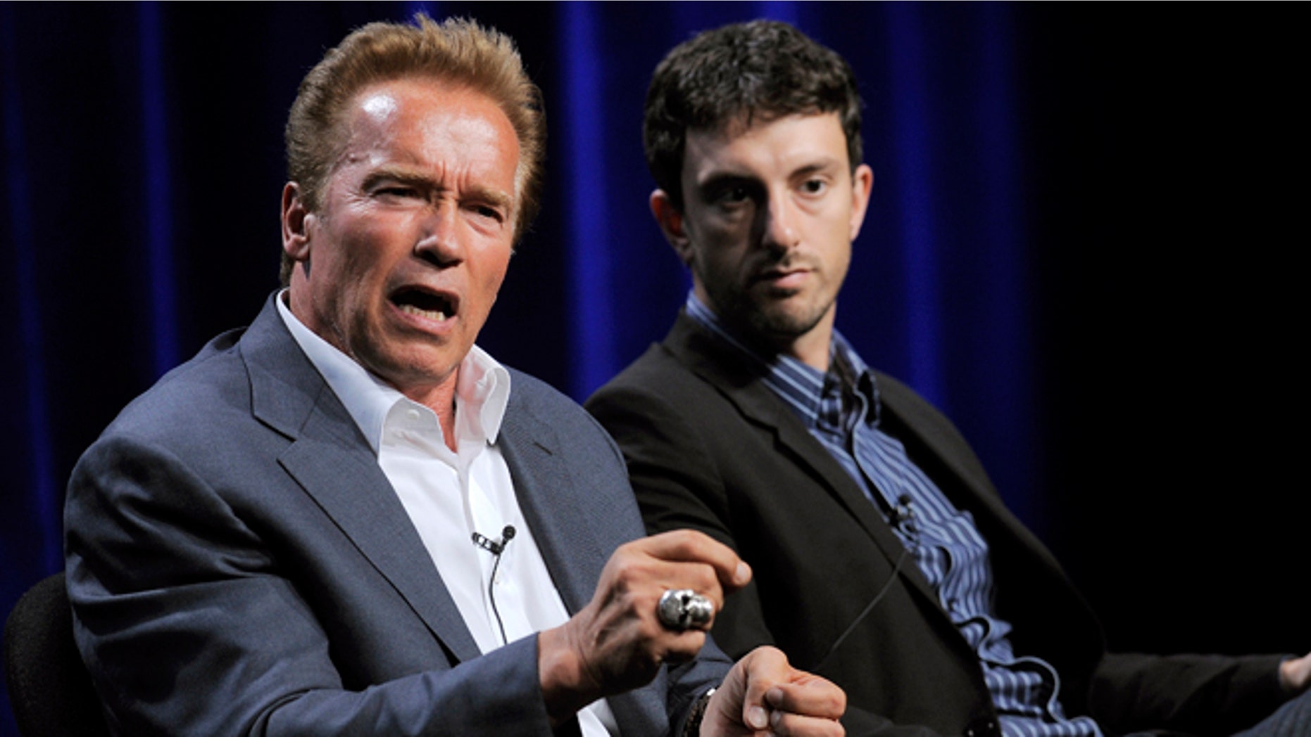 Aug. 3, 2012: Former California Gov. Arnold Schwarzenegger, left, the subject of a forthcoming ESPN short film, answers a question as the film's co-director Michael Zimbalist looks on during the ESPN Films "30 for 30 Shorts" TCA panel discussion at the Beverly Hilton hotel in Beverly Hills, Calif.