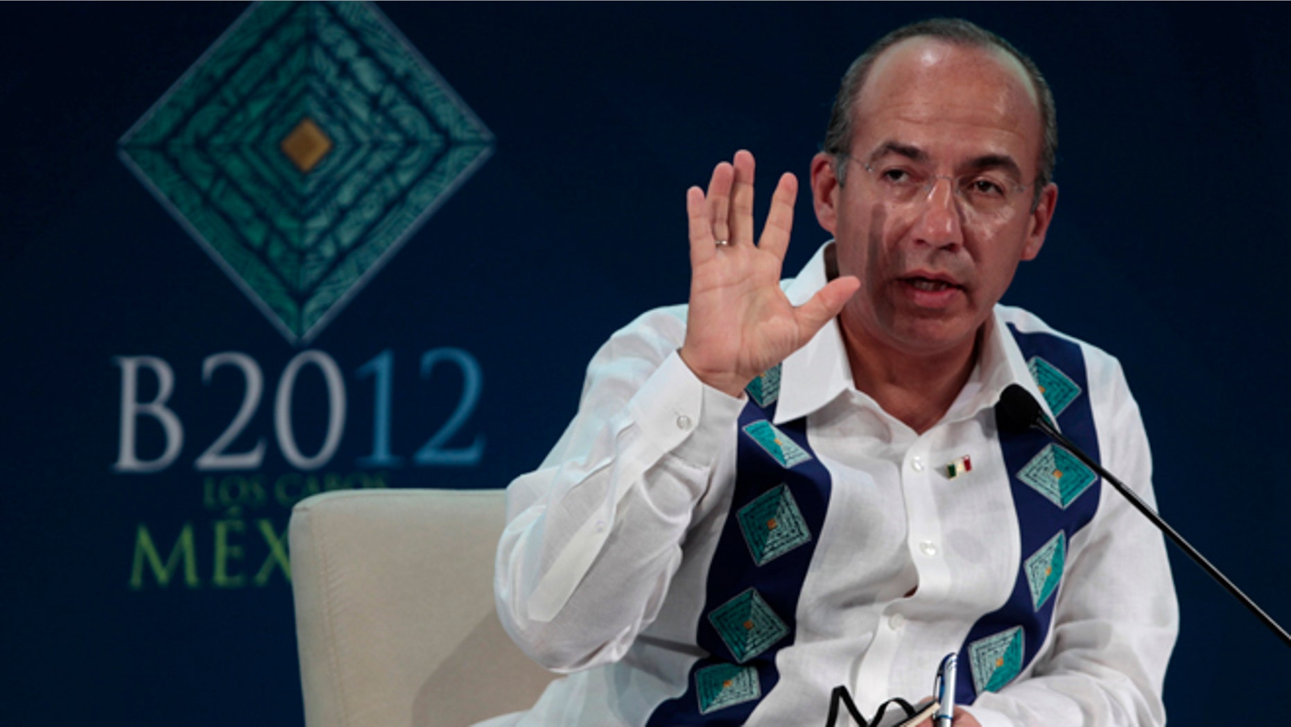 Mexico's President Felipe Calderon speaks during a B20 meeting prior to the G20 Summit in Los Cabos, Sunday, June 17, 2012. (AP Photo/Esteban Felix)