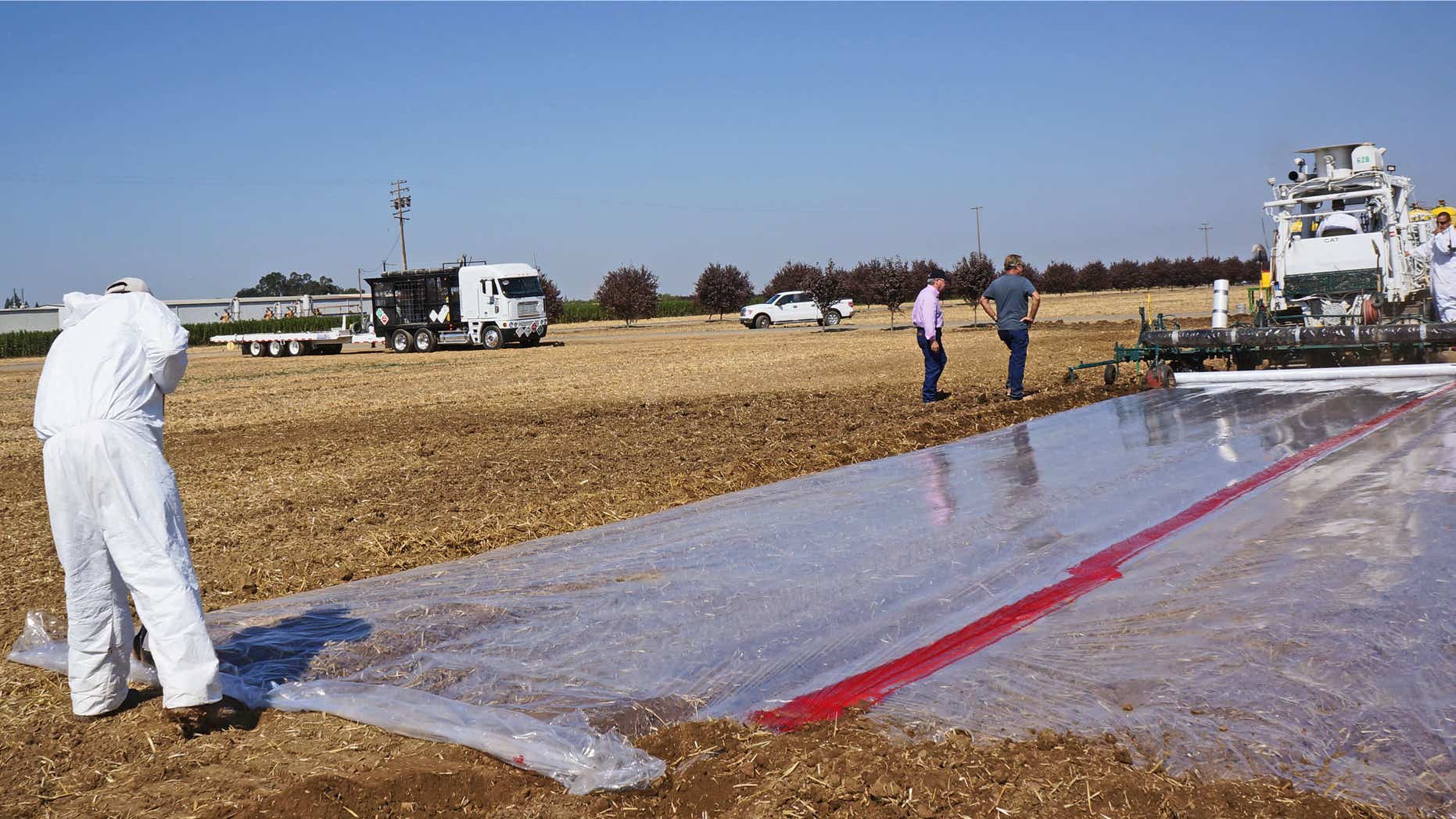 Sept. 27, 2012: Workers test soil in Yuba City, Calif.