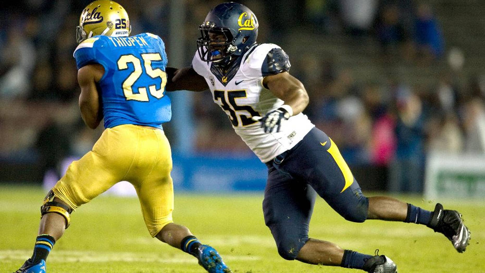 File - This Oct. 12, 2013, file photo released by GoldenBearSports.com shows California's Ted Agu, right, tackling UCLA's Damien Thigpen, in Pasadena, Calif. Attorneys representing the family of Agu, who died following an offseason training run on Feb. 7, 2014, are planning to file a wrongful death lawsuit against the regents of the University of California. (AP Photo/GoldenBearSports.com, Michael Pimentel, file) MANDATORY CREDIT