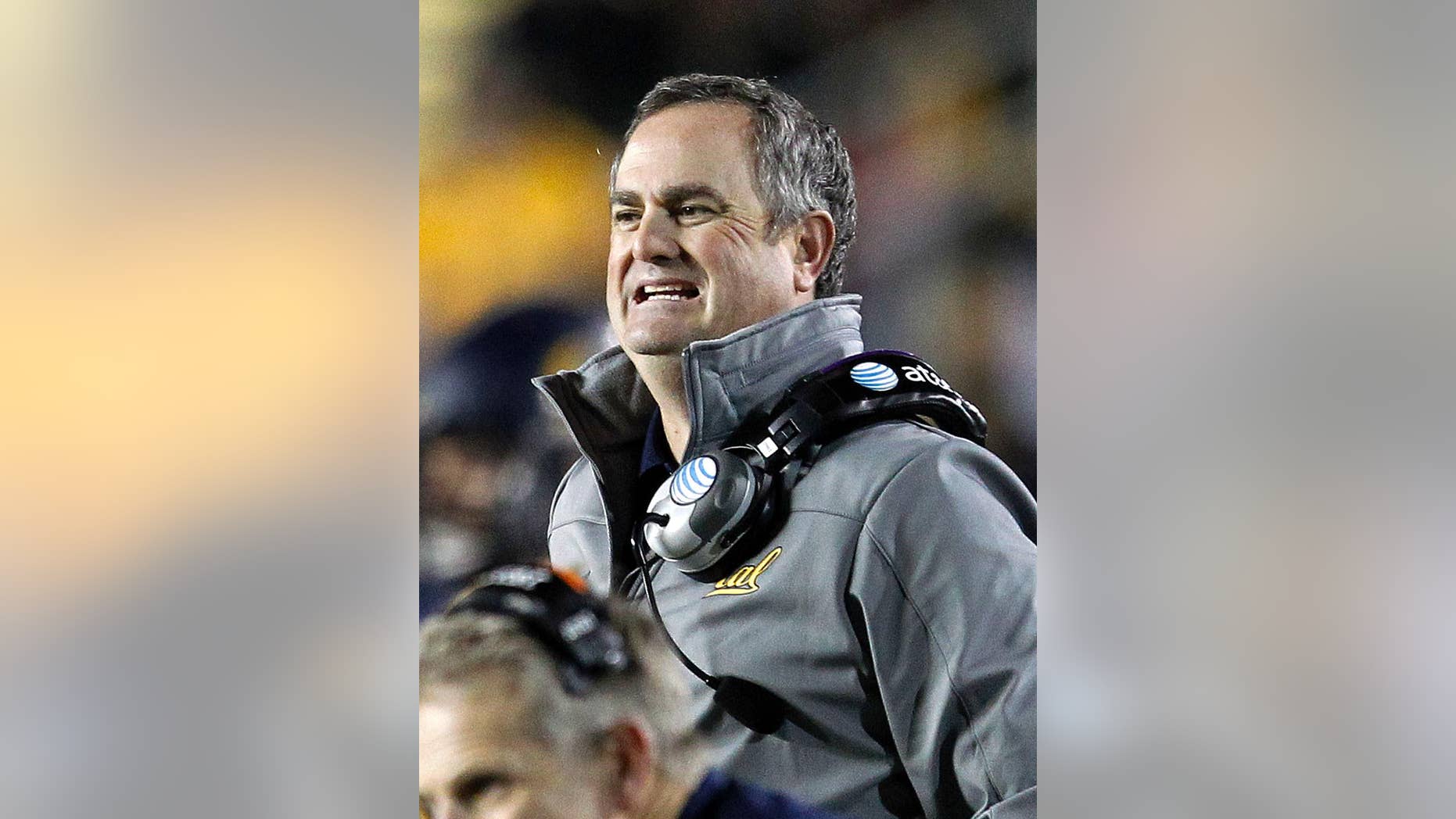 FILE - In this Oct. 19, 2013, file photo, California head coach Sonny Dykes reacts on the sidelines against Oregon State during an NCAA college football game in Berkeley, Calif. The difference in attitude at California is stark heading into coach Dykes' second season. The players are excited about practice, focused on football and eager to put last season's disappointing one-win campaign far in the past. (AP Photo/Tony Avelar,File)