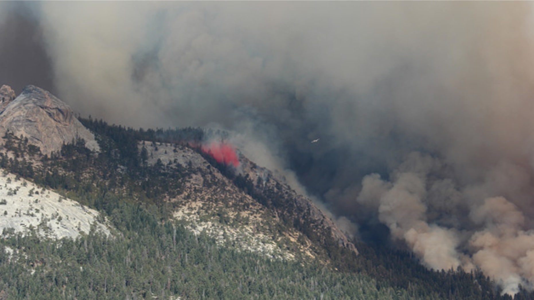 September 7, 2014: This photo provided by Rachel Kirk shows smoke from a fire rising above Little Yosemite Valley near Yosemite National Park, Calif. (AP Photo/Rachel Kirk)