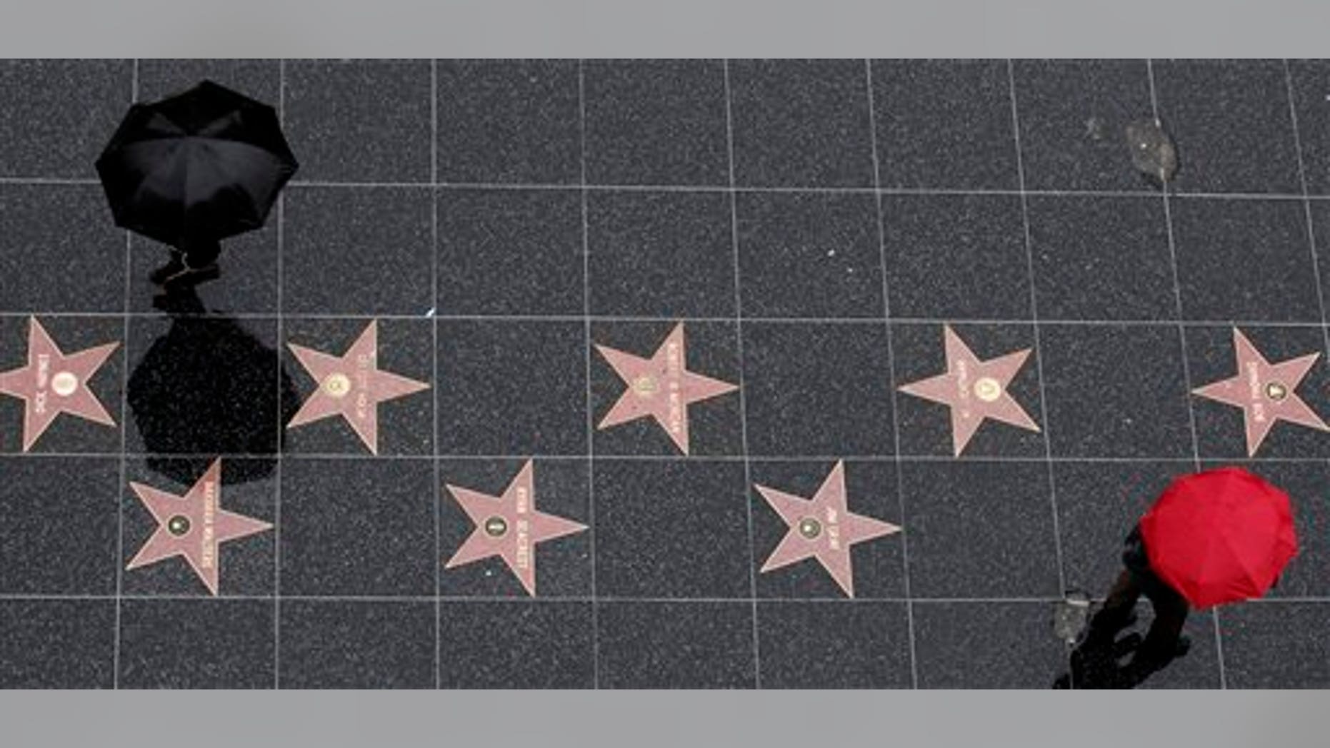 Dec. 20: Tourists walk on the Hollywood Walk of Fame in the Hollywood section of Los Angeles.