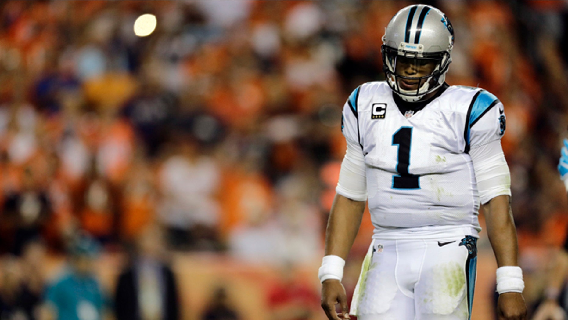 FILE - In this Sept. 8, 2016, file photo, Carolina Panthers quarterback Cam Newton (1) walks to the sidelines during the second half of an NFL football game against the Denver Broncos in Denver. The Panthers are hoping Newton can get back on the field in preparation for Sunday's game against New Orleans, but right now he remains in the concussion protocol.(AP Photo/Joe Mahoney, File)