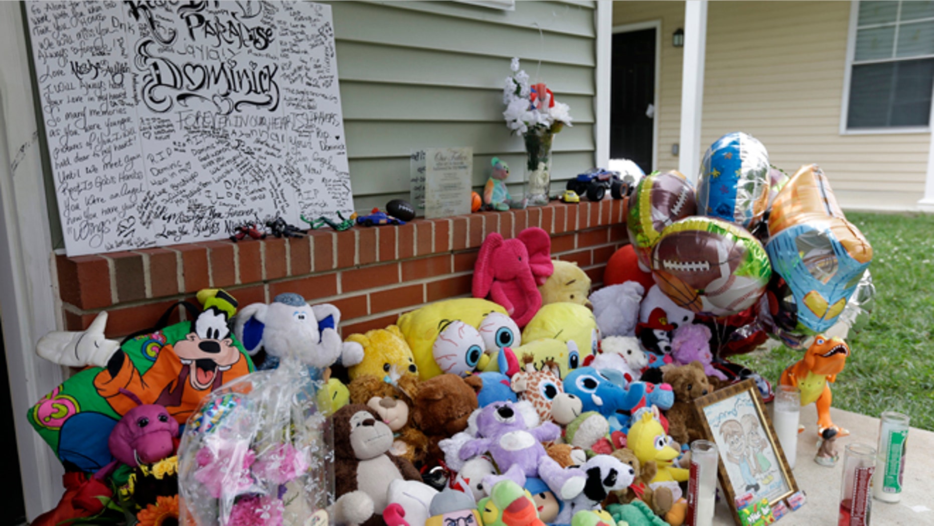 Sept. 4, 2012: A makeshift memorial for a slain boy sets on his front porch in Camden, N.J.