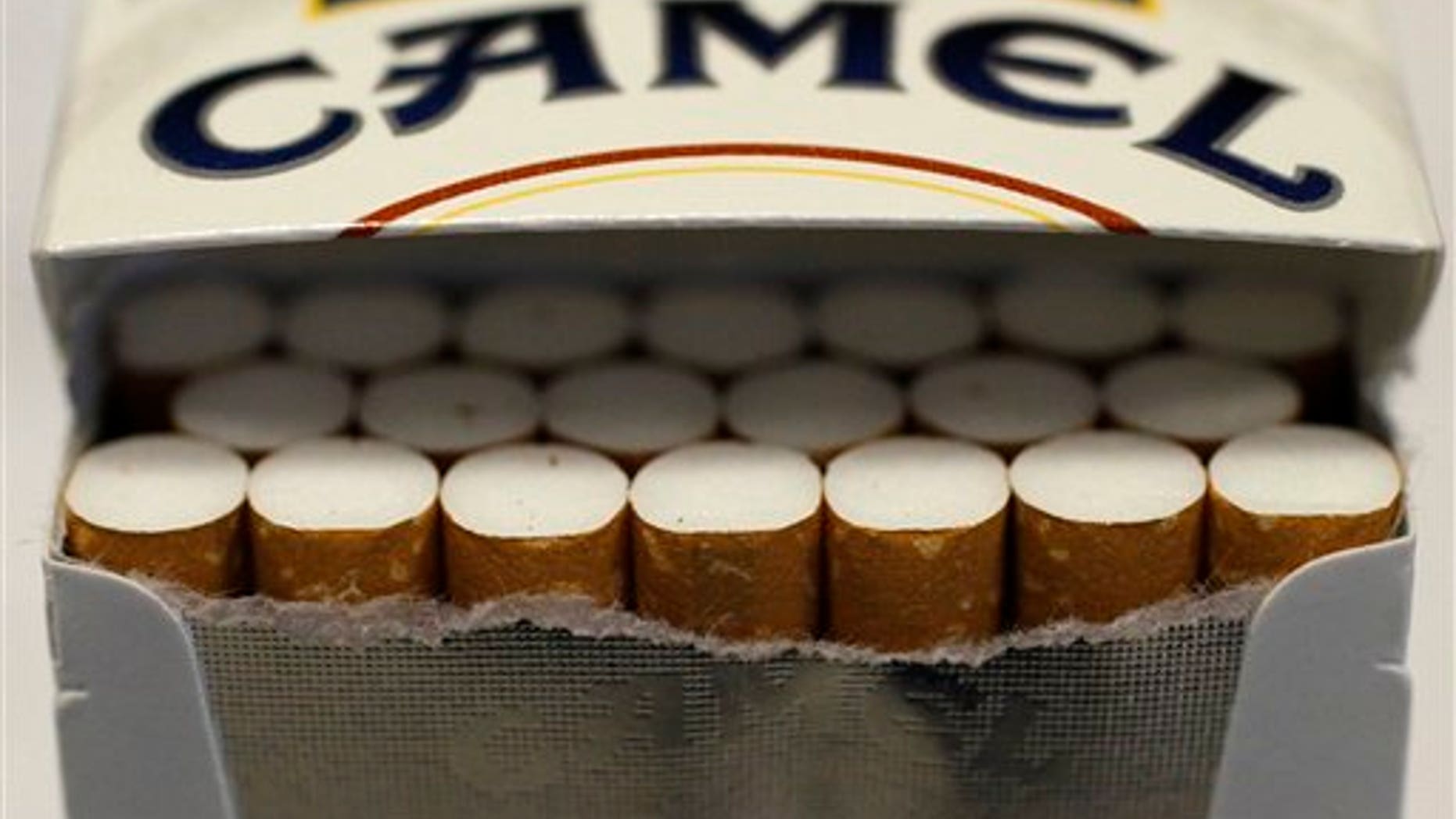 Pictured is an open pack of Camel cigarettes purchased Friday, Nov. 30, 2012, in Chicago. New tobacco products have come nearly to a halt in the U.S. because regulatory reviews for thousands of applications required by a 2009 law are taking much longer than the law requires. Though it might sound like good news from a health perspective, the halt demonstrates how tricky it is to start regulating an industry.(AP Photo/Charles Rex Arbogast)