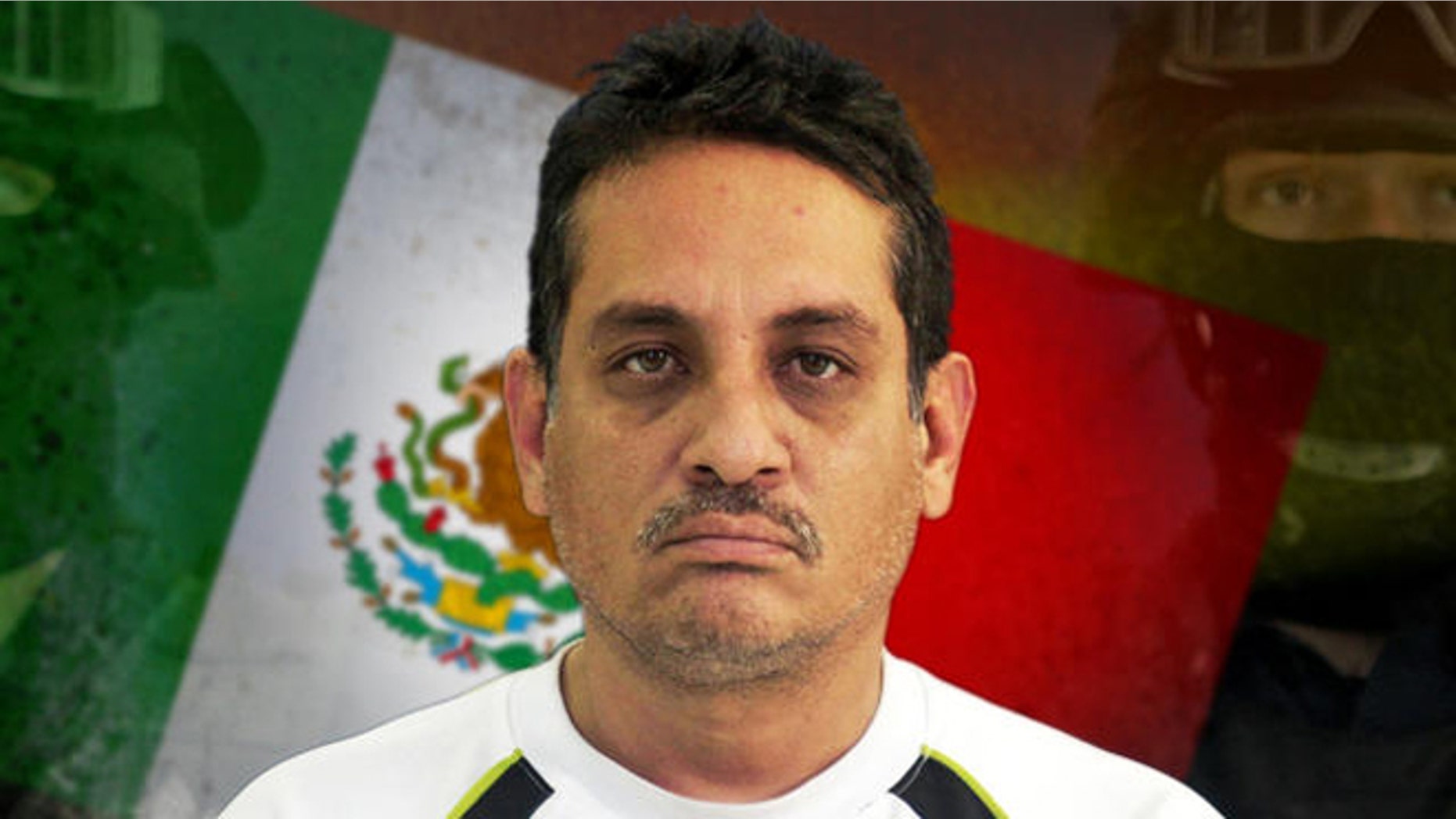 Jesus Ernesto Chavez, known as "El Camello" stands as he is guarded by federal police officers during a presentation to the press, in Mexico City, Friday, July 2, 2010. According to the federal police Chavez ordered the March 13 attack that killed a U.S. consulate employee and her husband as they drove in the violent border city. (AP Photo/Carlos Jasso)