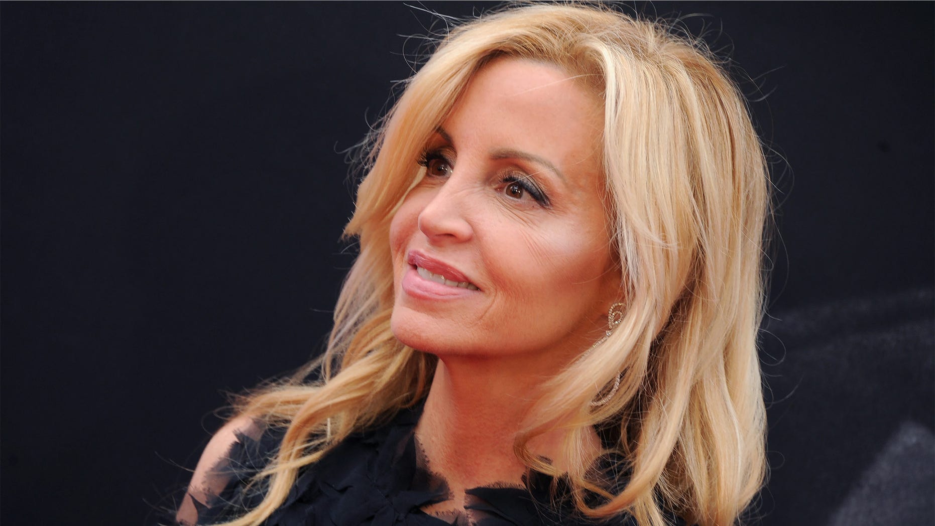 Camille Grammer flaunts her sexy beach body while enjoying her Hawaiian get away.