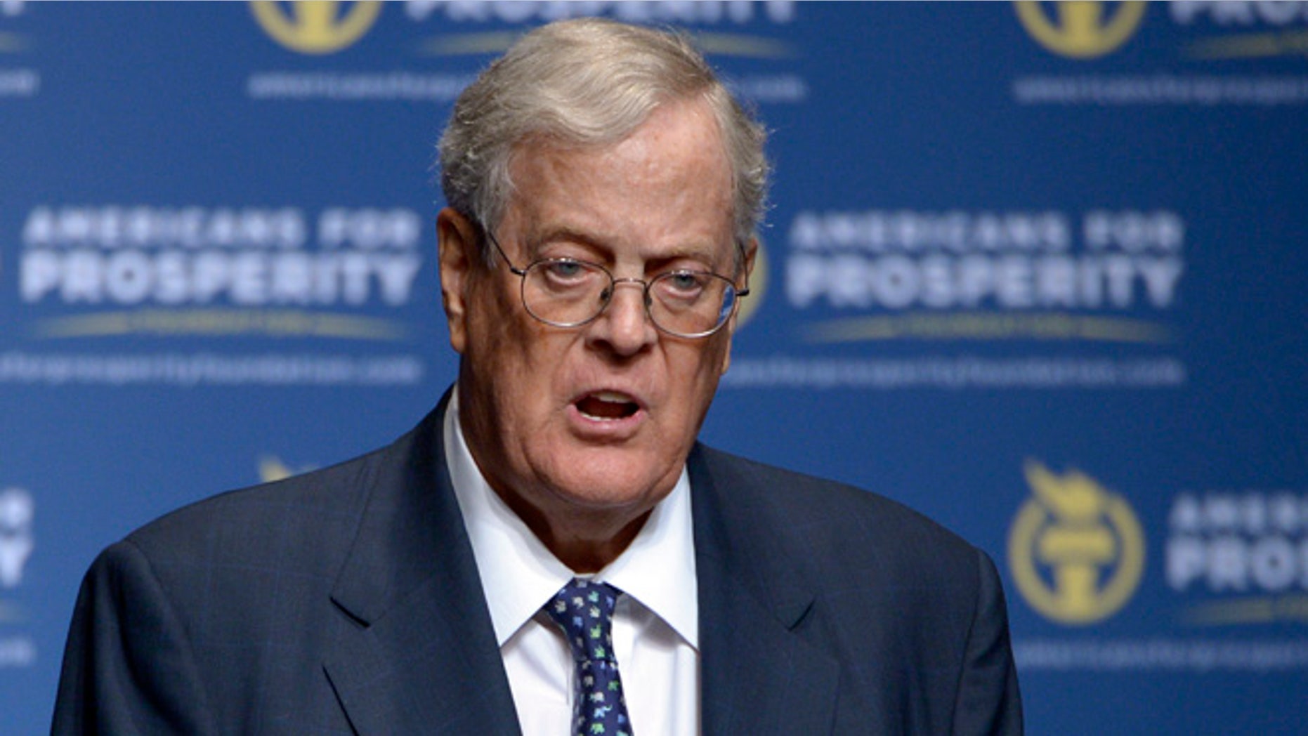 FILE - In this Aug. 30, 2013 file photo, David Koch speaks in Orlando, Fla. The Republican door-knockers are busy selling Pennsylvania Sen. Pat Toomey, and they never mention Donald Trump. Such is the 2016 landscape in battleground across the country, where hundreds of activists tied to the billionaire Koch brothers are eschewing the top of the ticket in favor of protecting the Republican majority in the Senate. (AP Photo/Phelan M. Ebenhack, File)