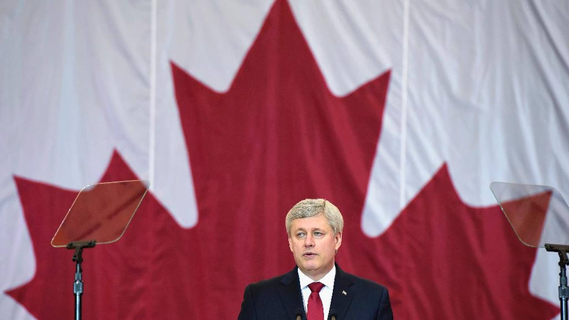 Prime Minister Stephen Harper makes an announcement in Richmond Hill, Canada on Friday, Jan. 30, 2015. (AP Photo/The Canadian Press, Frank Gunn)
