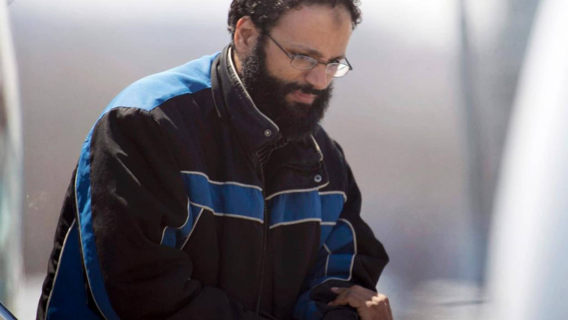 File - In this April 23, 2013, file photo, Chiheb Esseghaier, one of two suspects accused of plotting with al-Qaida to derail a train in Canada, arrives at Buttonville Airport, north of Toronto. Esseghaier and Raed Jaser were sentenced to life in prison Wednesday, Sept. 23, 2015. (Frank Gunn/The Canadian Press via AP, File) MANDATORY CREDIT