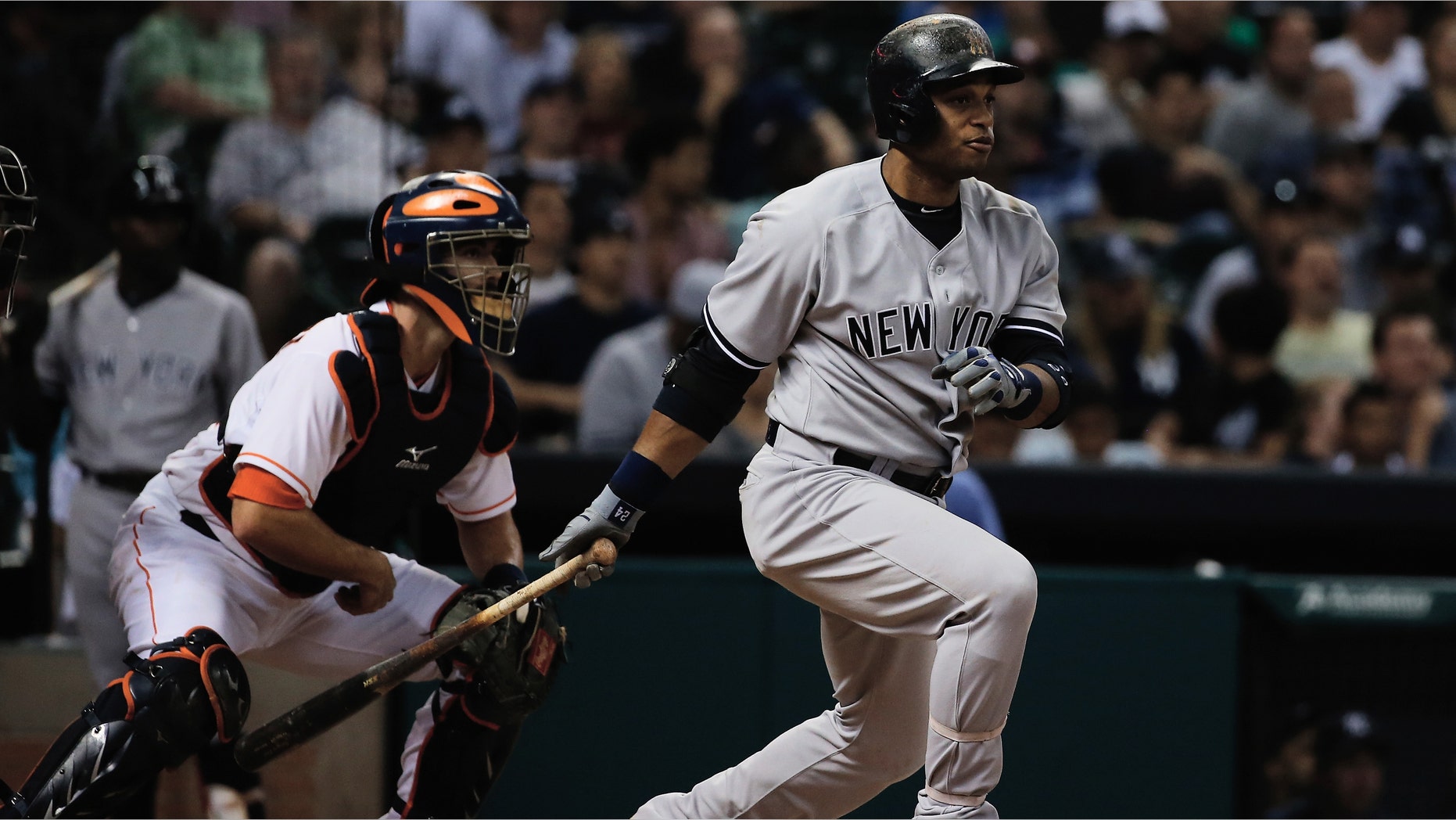 HOUSTON, TX - SEPTEMBER 28: Robinson Cano #24 of the New York Yankees hits a single in the sixth inning against the Houston Astros at Minute Maid Park on September 28, 2013 in Houston, Texas. (Photo by Scott Halleran/Getty Images)