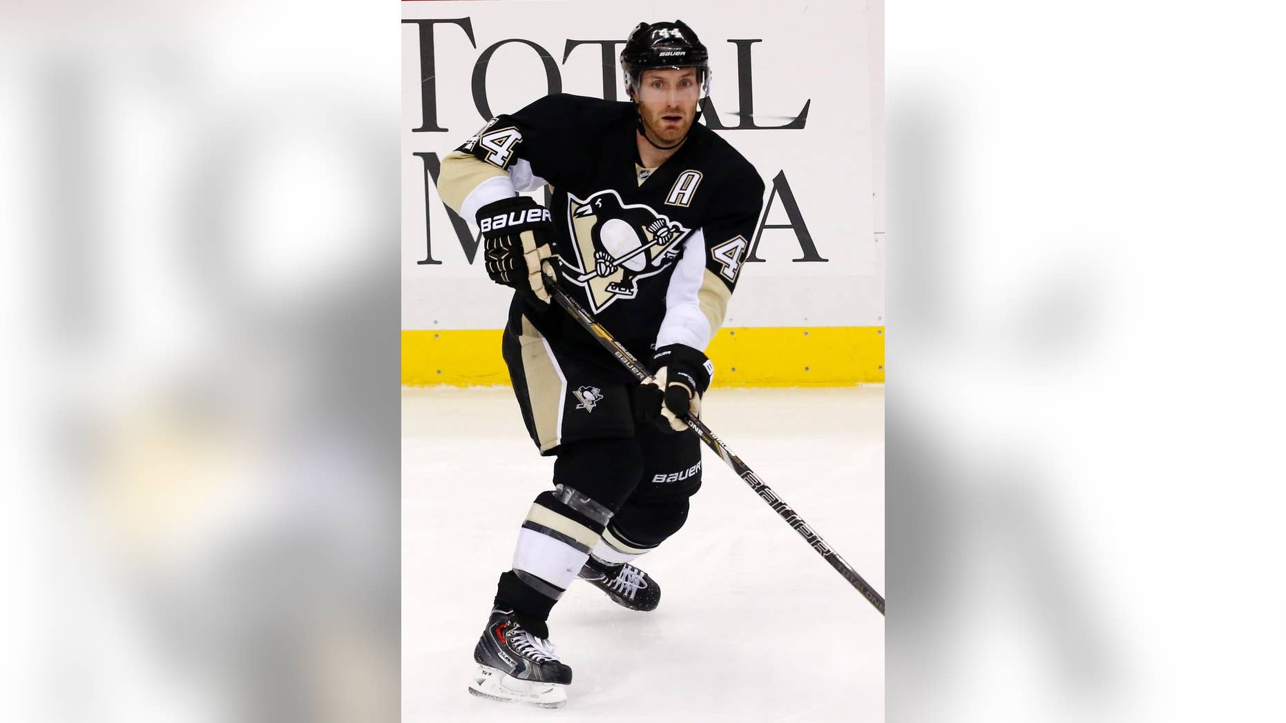 FILe - This is a Jan. 20, 2014 file photo showing Pittsburgh Penguins' Brooks Orpik (44) during an NHL hockey game against the Florida Panthers in Pittsburgh. The Washington Capitals opened free agency Tuesday , July 1, 2014, by signing defenseman Brooks Orpik to a $27.5 million, five-year contract, and goaltender Justin Peters to a $1.9 million, two-year contract. (AP Photo/Gene J. Puskar, File)