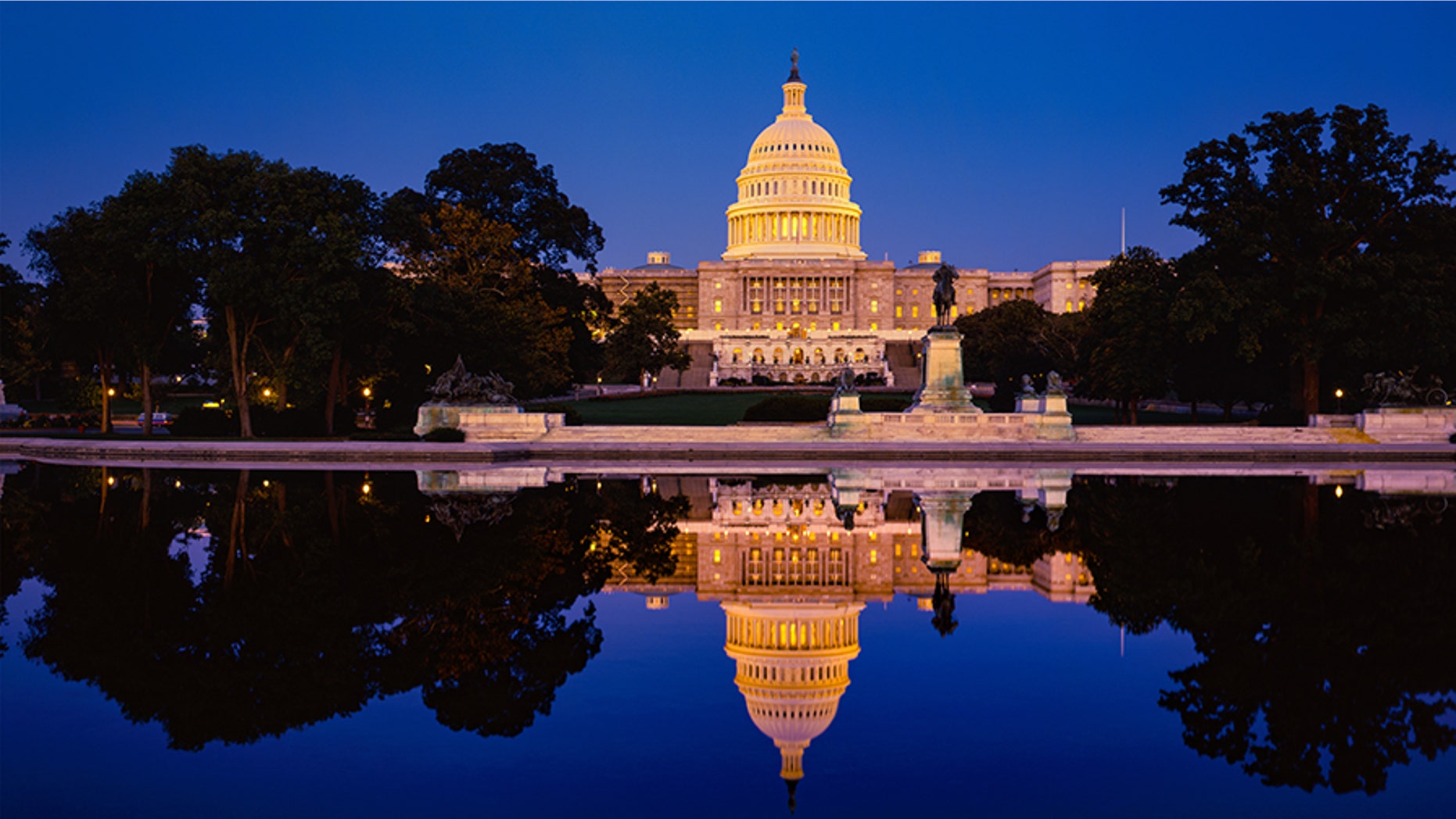 Capitol building with reflections at dusk Washingtom DC, USA