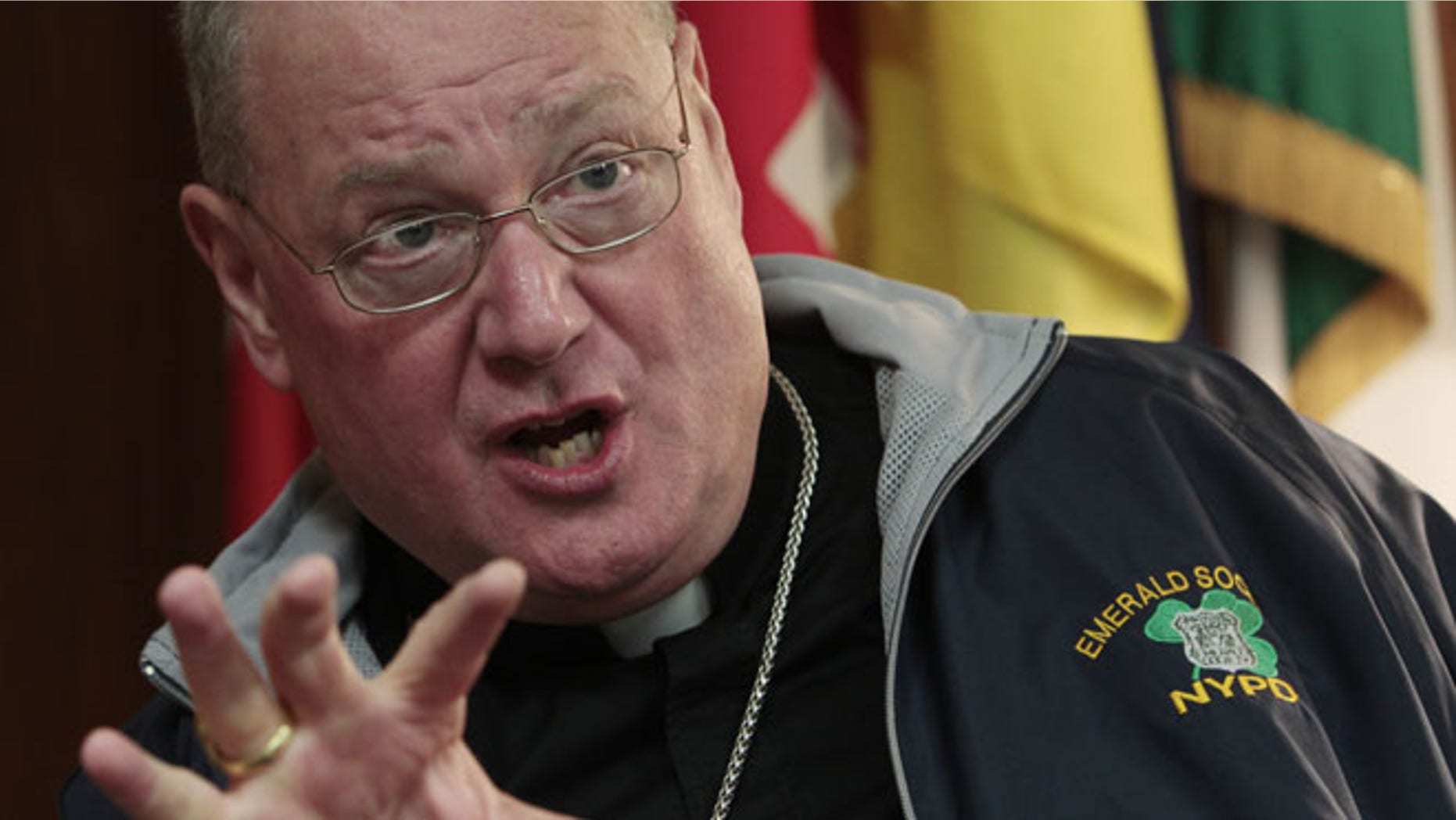 Archbishop of New York, Timothy Dolan, gestures during an interview at the North American College in Rome, Tuesday, Feb. 14, 2012. The top U.S. bishop has vowed legislative and court challenges to President Barack Obama's compromise on exempting religiously affiliated employers from paying directly for birth control for their workers. Cardinal-designate Timothy Dolan, who heads the U.S. Conference of Catholic Bishops, said in an interview Tuesday with The Associated Press that while Obama's about-face Friday initially sparked glimmers of hope in the Catholic Church, it ended up being a "hill of beans." (AP Photo/Gregorio Borgia)