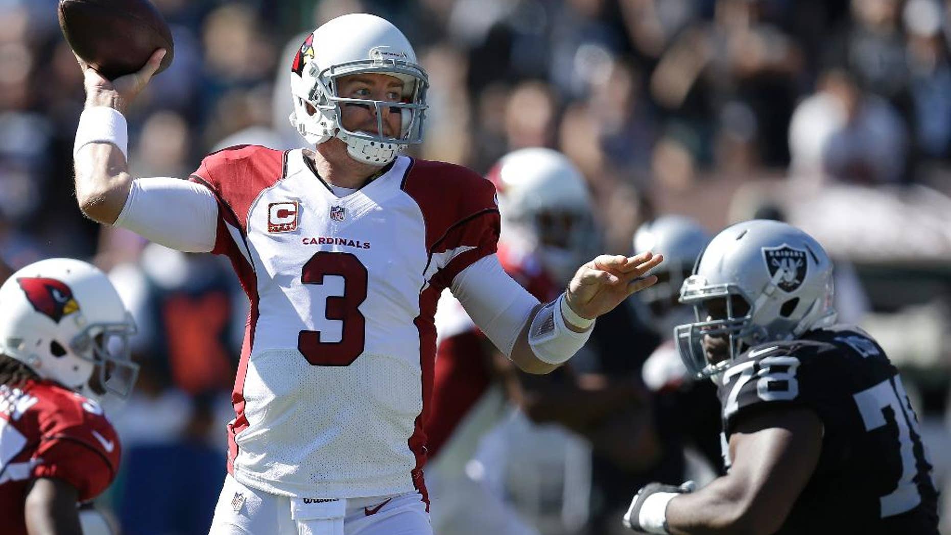 Oakland Raiders interim head coach Tony Sparano gestures from the sideline during the first half of an NFL football game against the Arizona Cardinals in Oakland, Calif., Sunday, Oct. 19, 2014. (AP Photo/Marcio Jose Sanchez)