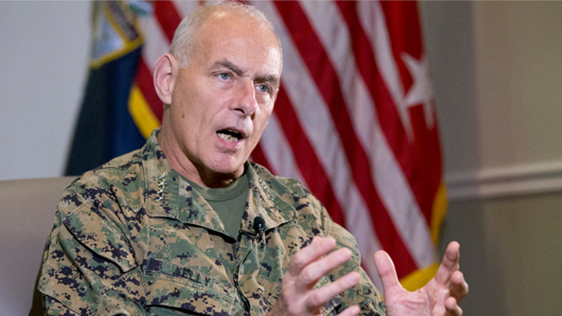Marine Corps Gen. John F. Kelly, Commander of the U.S. Southern Command, gestures as he speaks during an interview with The Associated Press, Tuesday, Jan. 12, 2016, in Miami. Kelly says Cuba will attend an annual Caribbean security conference for the first time in another sign of normal relations between the long-hostile nations. The three-day event co-hosted by U.S. Southern Command will be this month in Jamaica. (AP Photo/Wilfredo Lee)