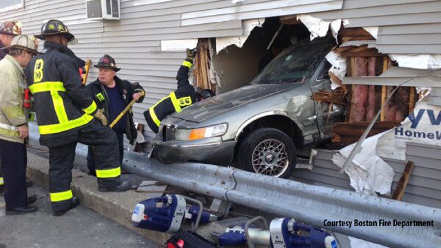 Feb. 1, 2014: This photo shows a car that crashed through a Rite Aid store in South Boston.