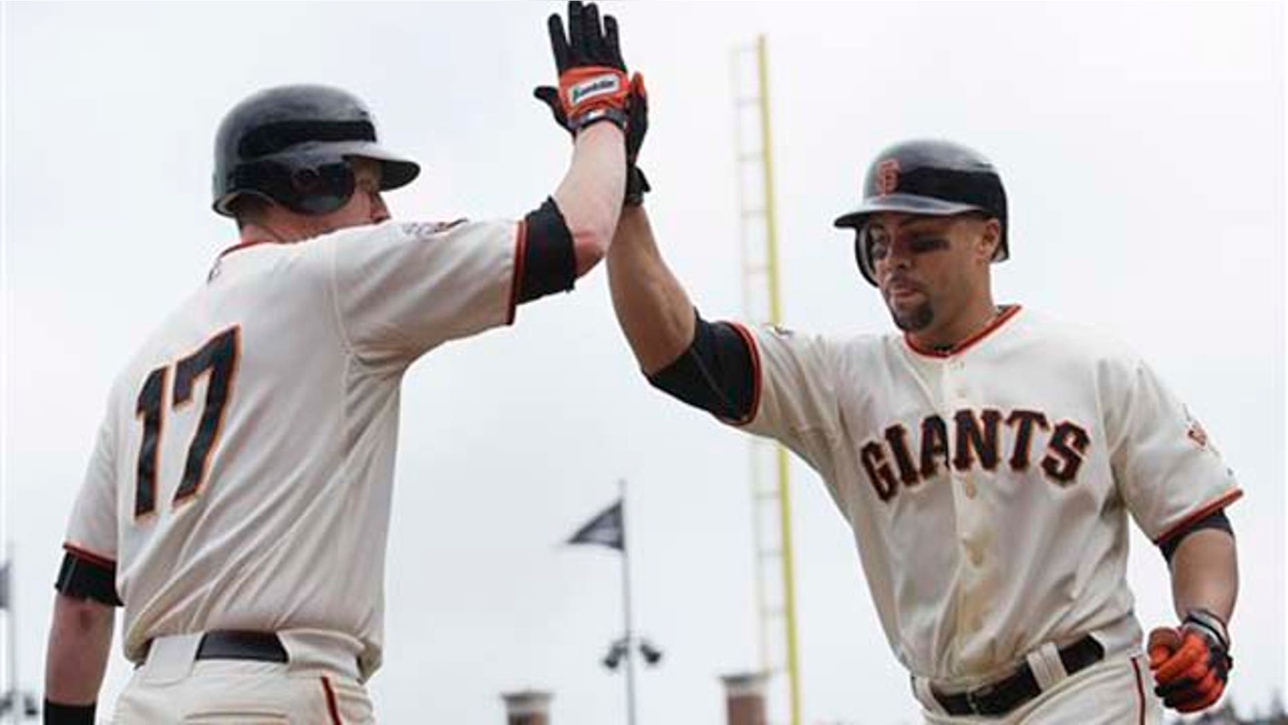 Sept. 14, 2011: San Francisco Giant's Carlos Beltran, right, celebrates with Aubrey Huff after hitting a solo home run off of San Diego Padres starting pitcher Mat Latos in the sixth inning of a baseball game in San Francisco, on Wednesday.. It was Beltran's 300th career home run and his second home run of the day.