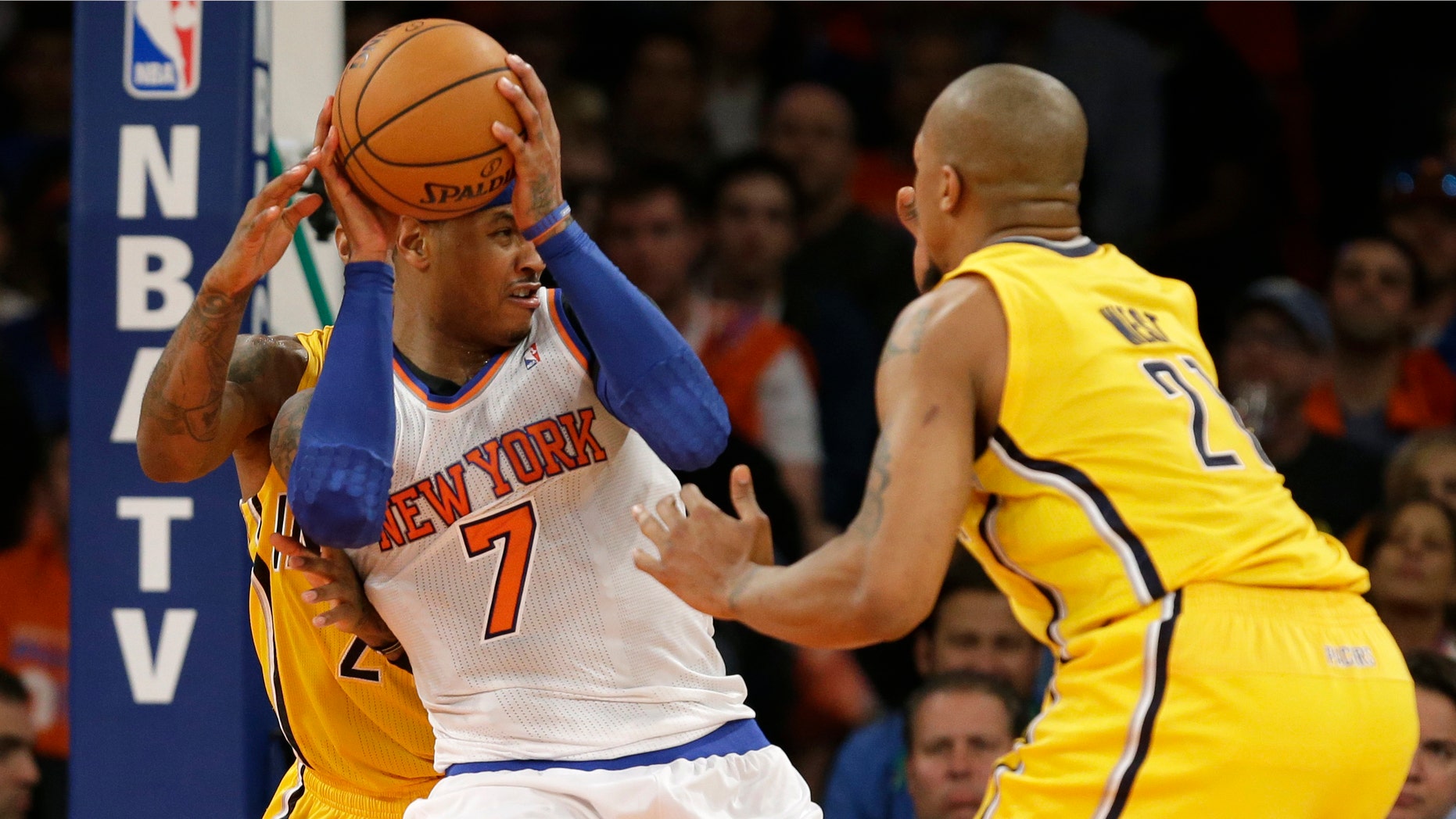 Indiana Pacers forward Paul George, left, and Pacers forward David West (21) in the second quarter of Game 1 of their second-round NBA basketball series at Madison Square Garden in New York, Sunday, May 5, 2013. (AP Photo/Kathy Willens)