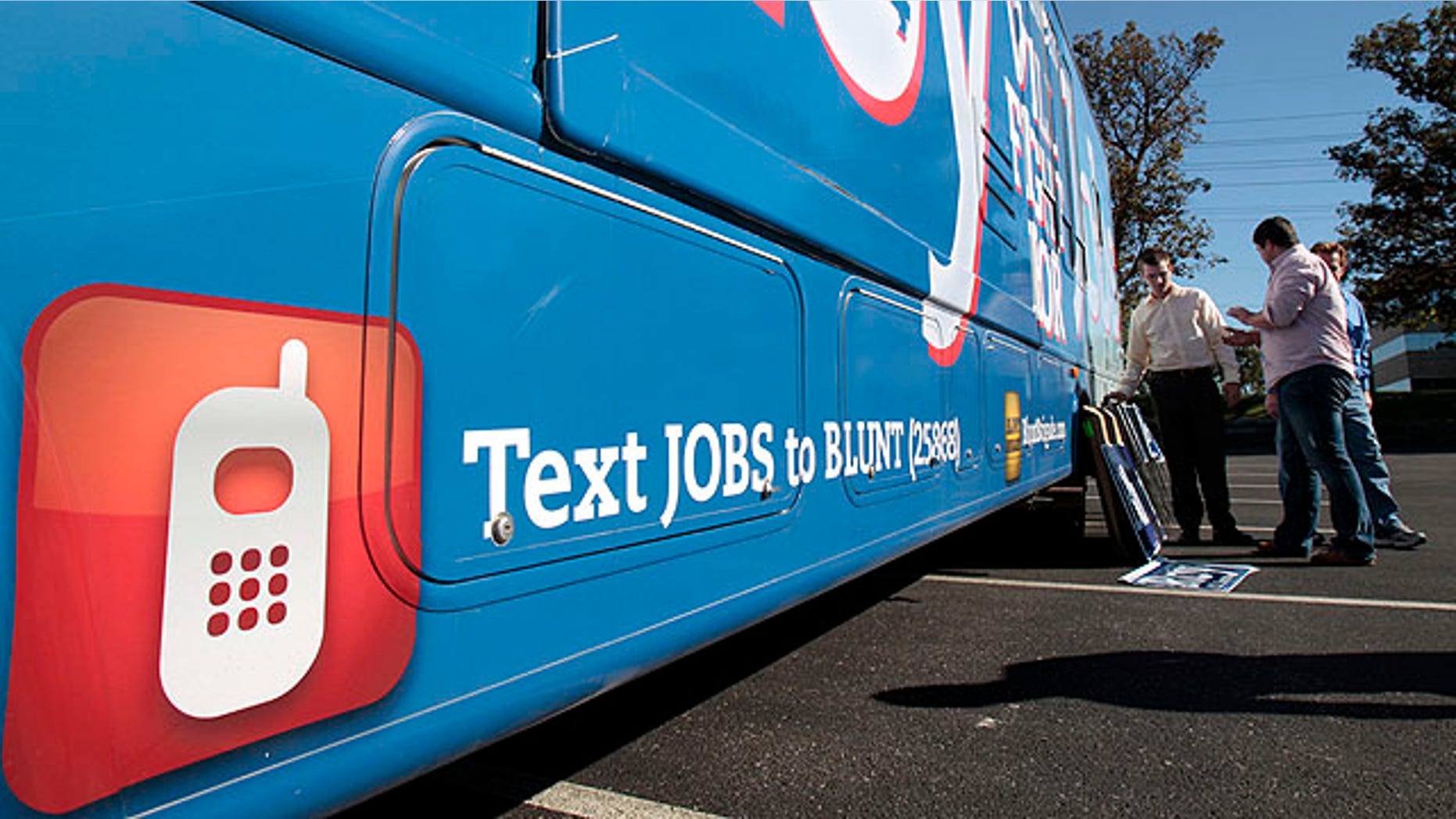 Oct. 1, 2010: workers load an RV with campaign signs outside a Roy Blunt for Senate office in Sunset Hills, Mo. Like many candidates this year, Blunt and his Democratic challenger Robin Carnahan are attempting to duplicate the successful social media strategies of Barack Obama's 2008 presidential campaign, which built an enormous cell phone database by seeking text messages from supporters.